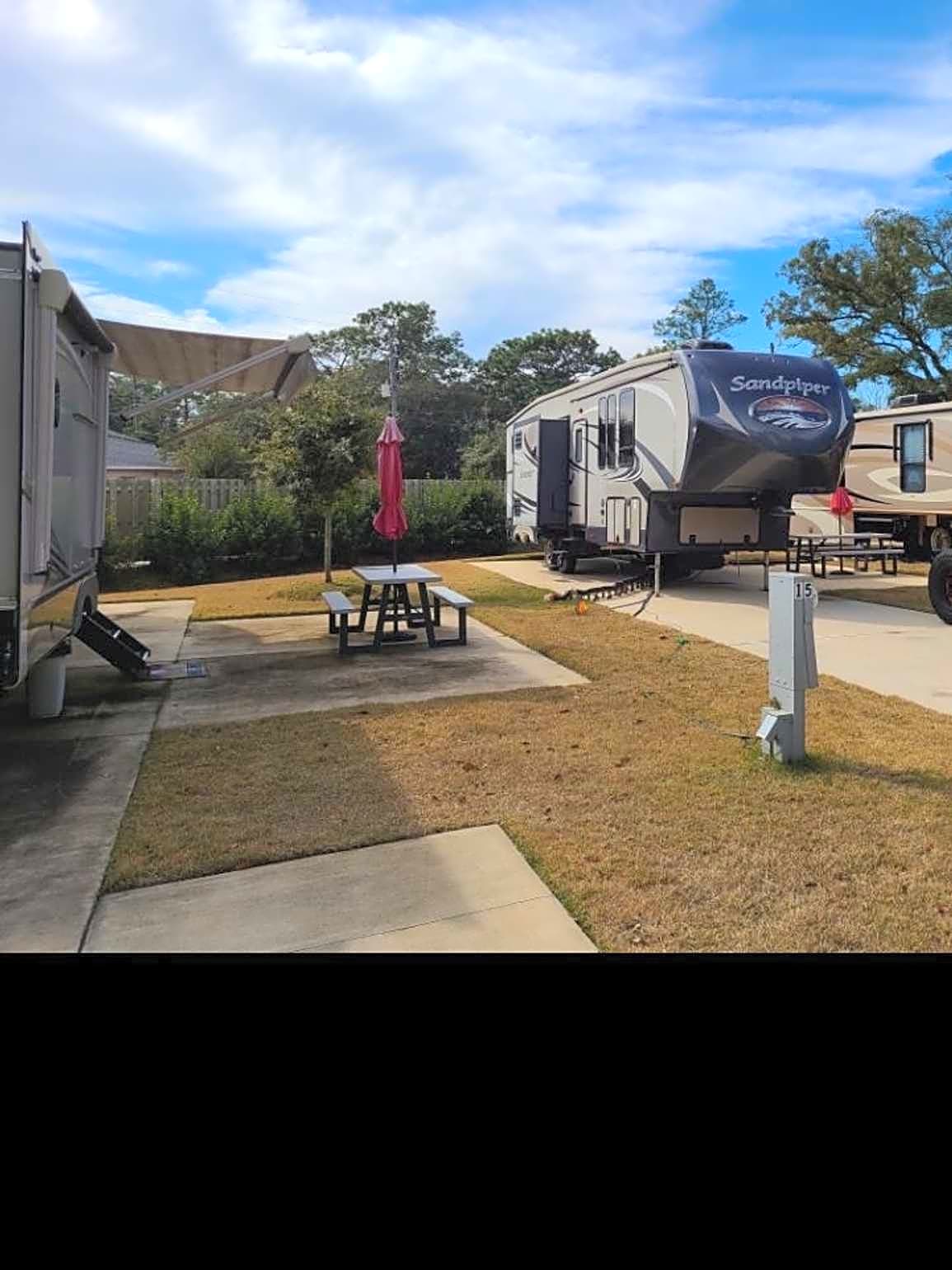Hybrid pull in/back in, All RVs (patio opposite side)