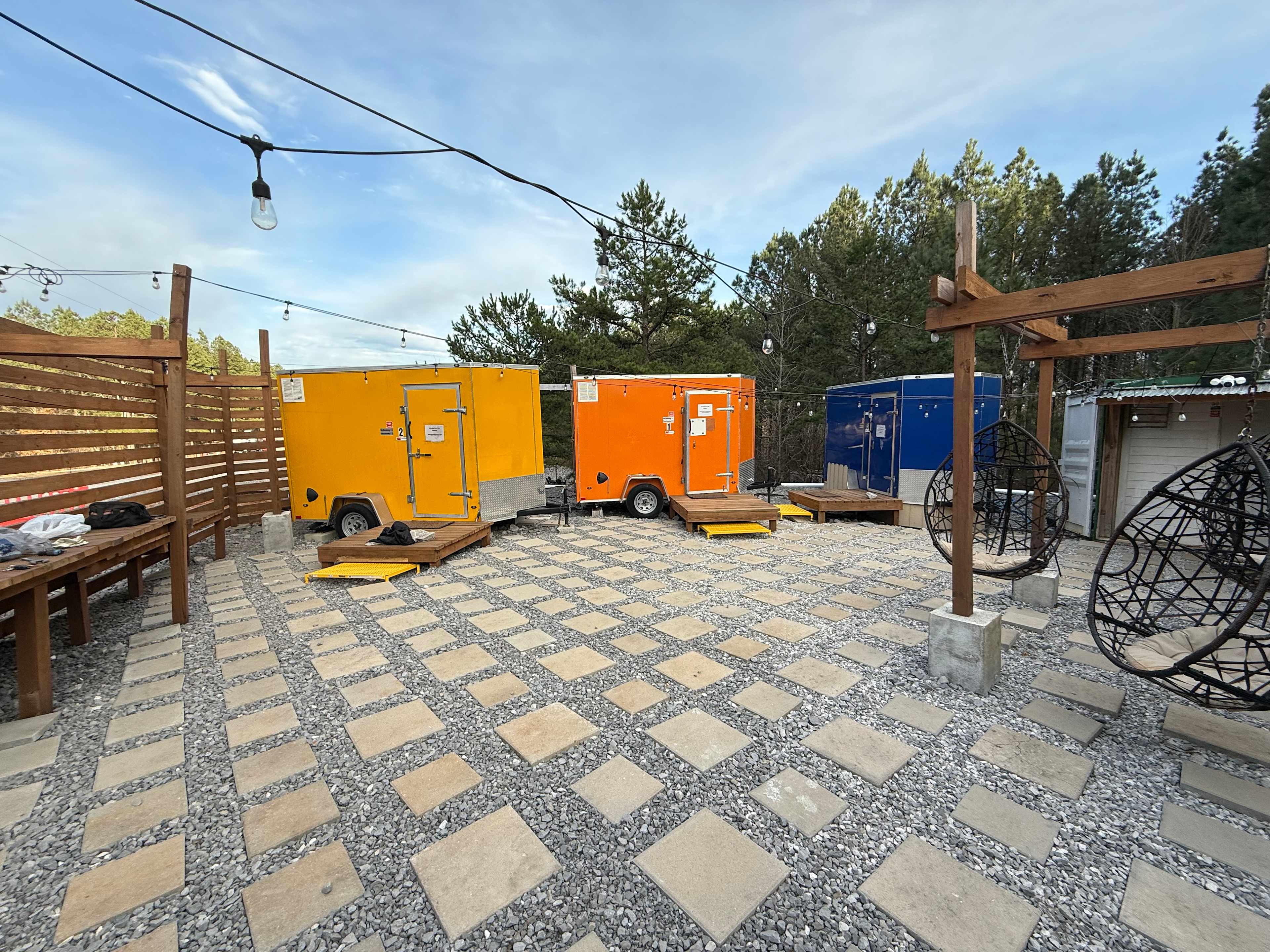 Courtyard with 3 bath houses and laundry facilities (2 washers and dryers) + swings too