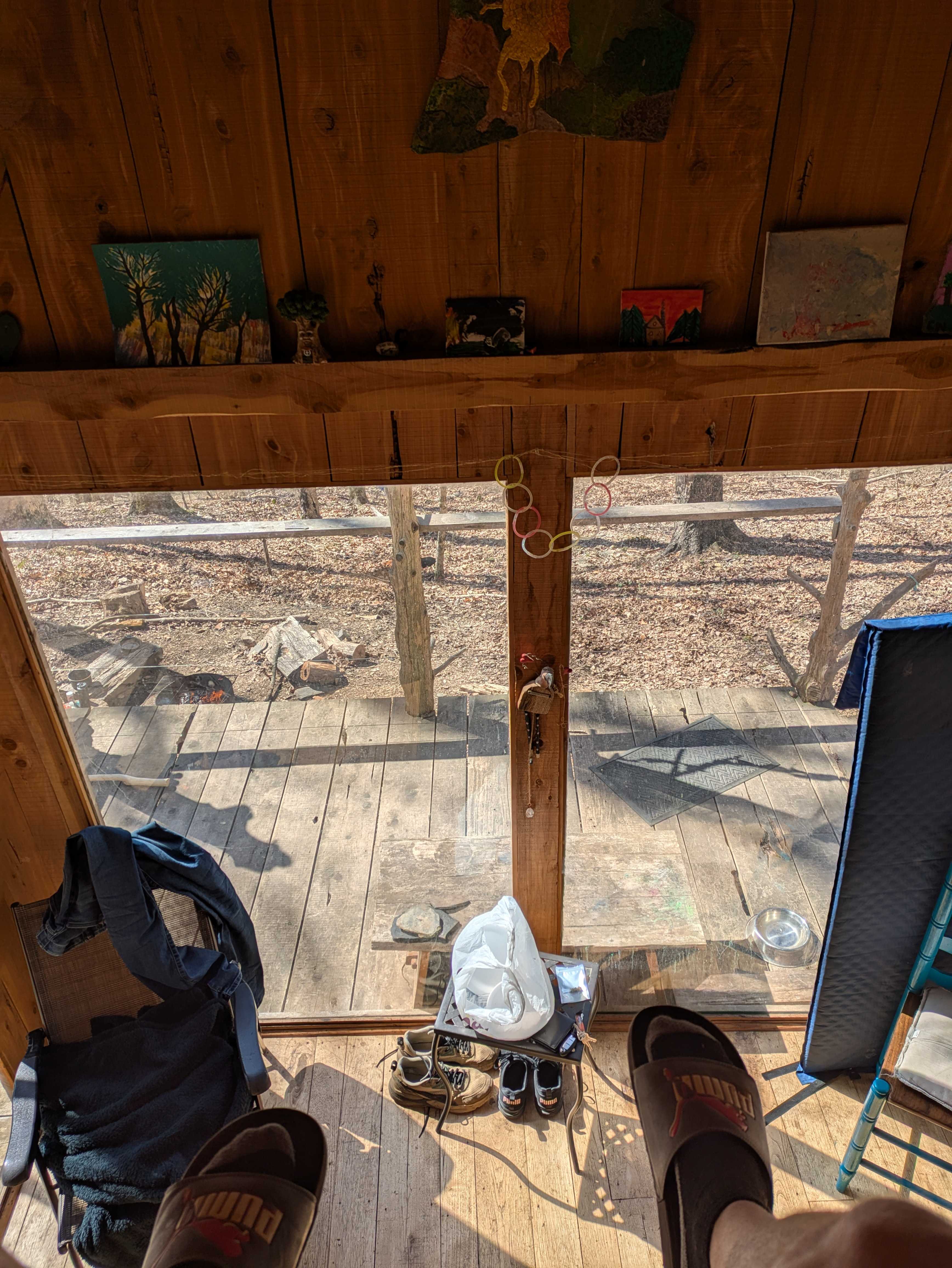Sitting in the loft bed. It had a warm blankets and pillows for the soft futon. We had sleeping bags and our own pillows tho.