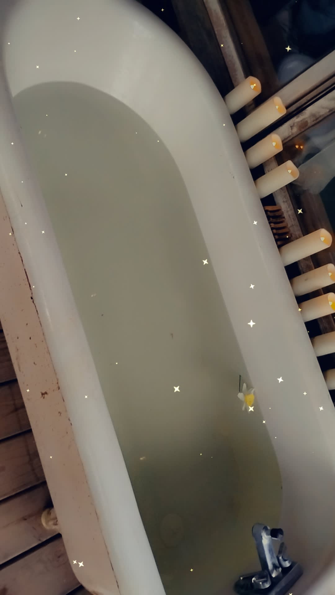 Claw foot tub on the screened in porch 😍