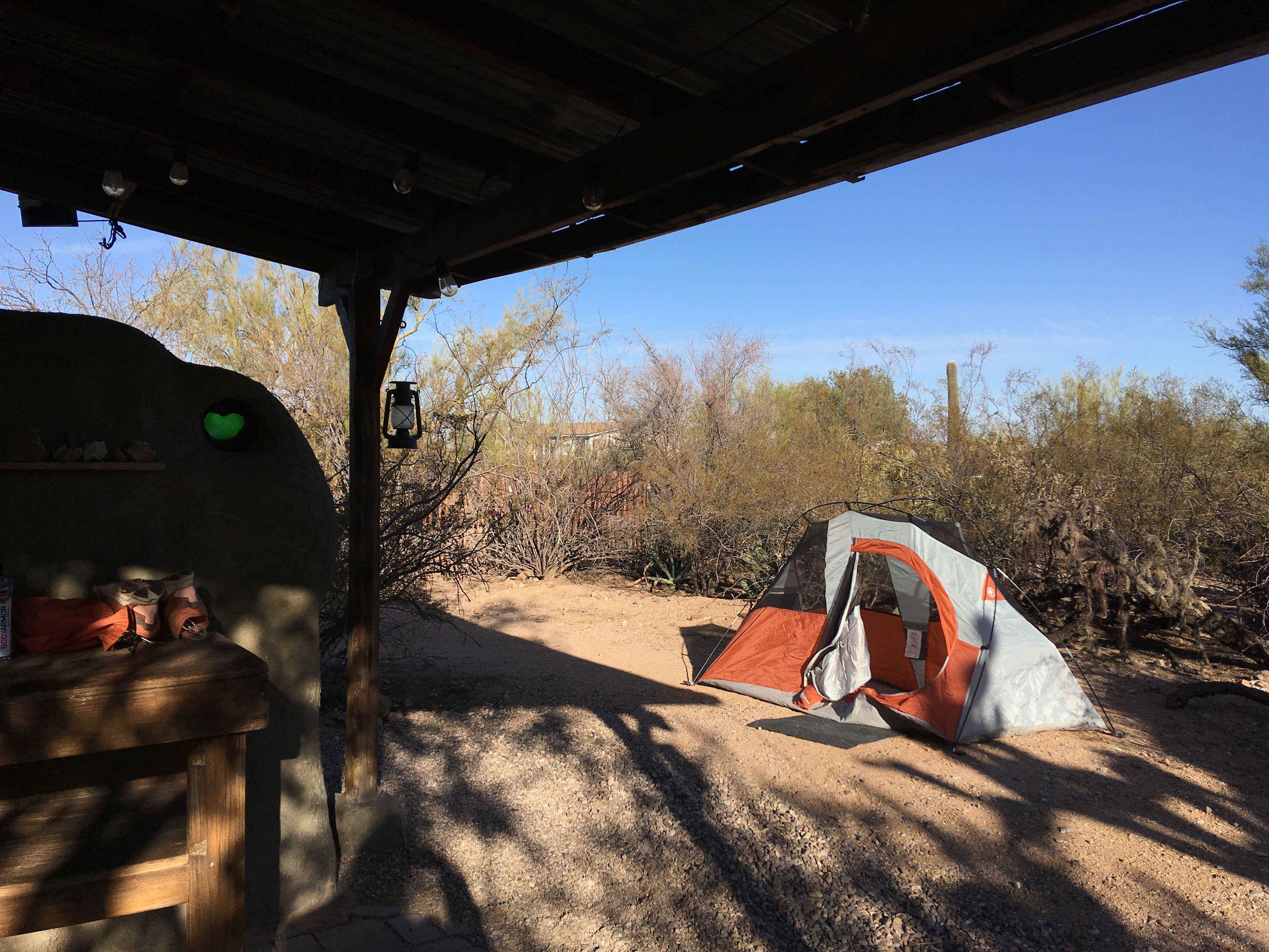 We had plenty of room to set a tent outside.. The bed frame inside held a queen sized air mattress perfectly. 