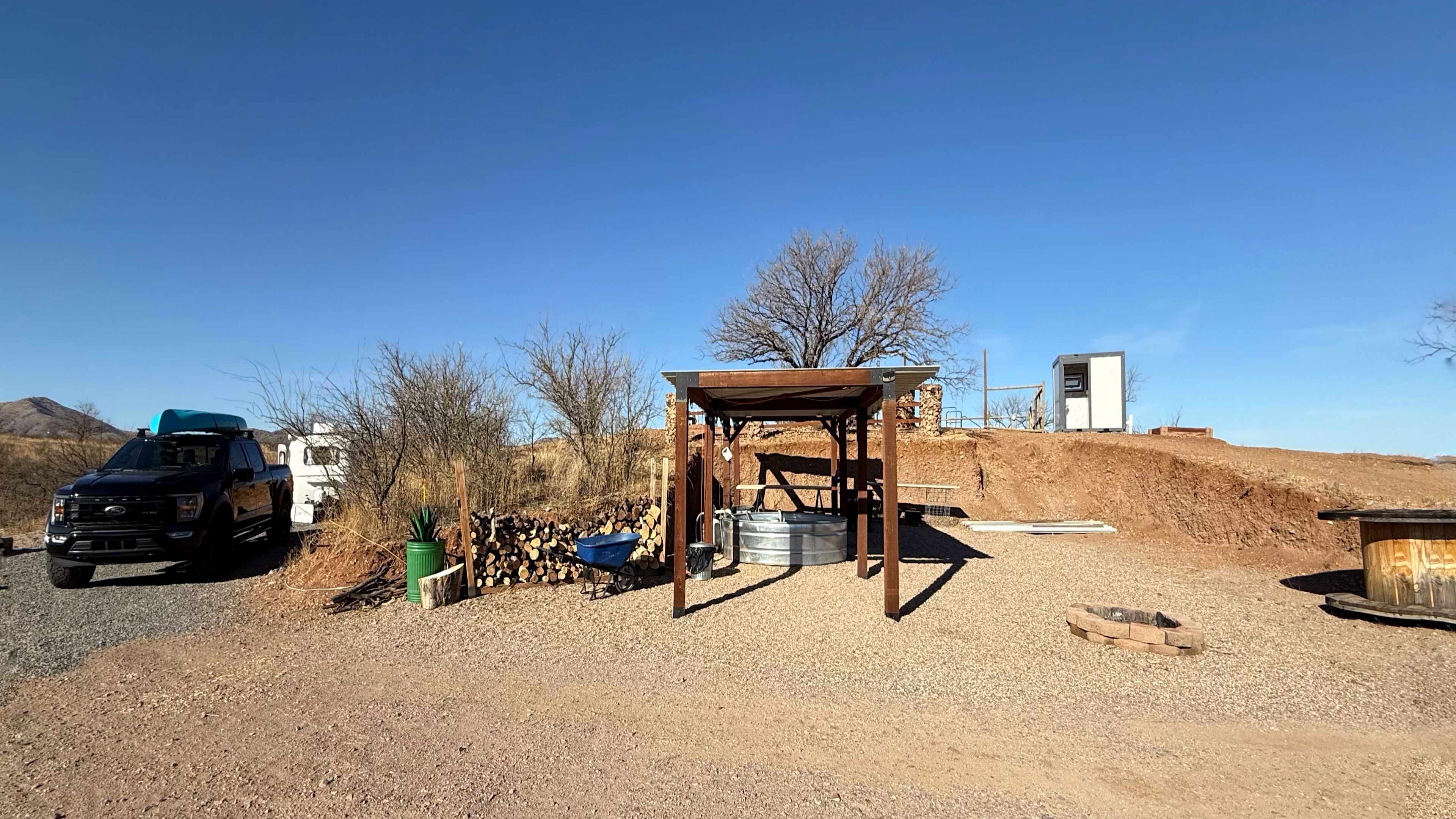 Site proximity to Cowboy Pool & Private Restroom (on hilltop).