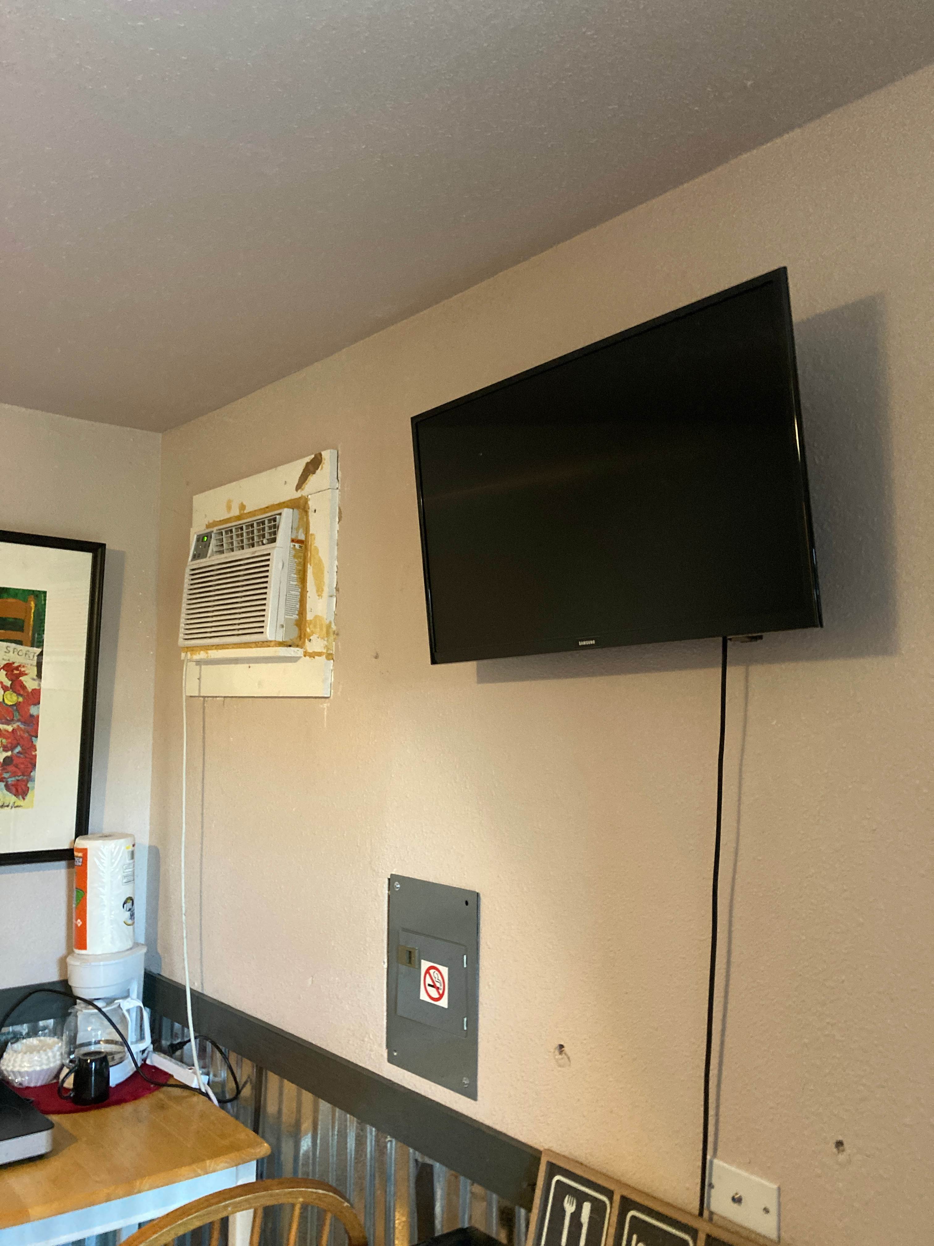  Air conditioner & SmartTV— Bring your own WiFi.