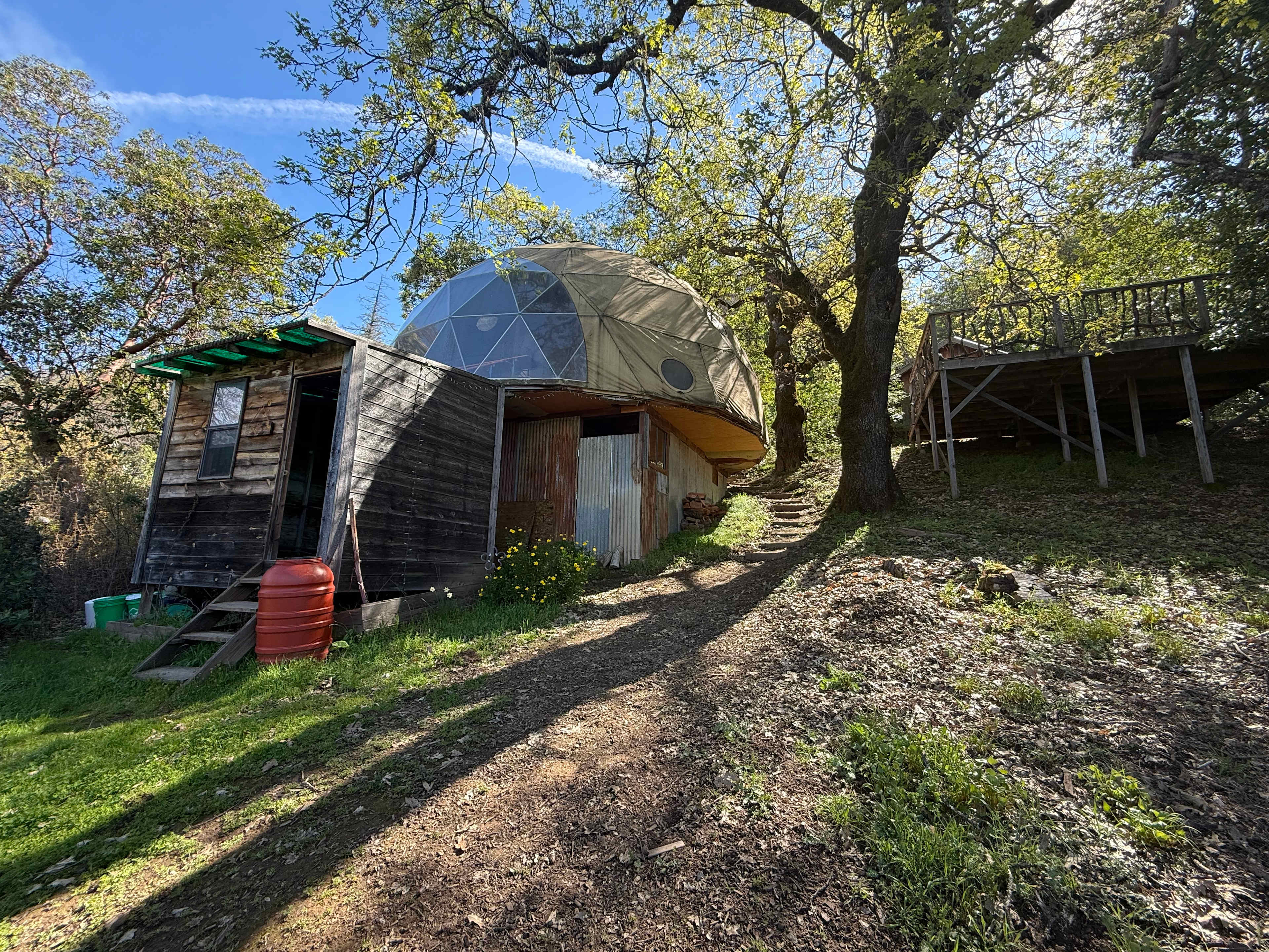 Full view of the dome from below and the bathroom, which also has a shower you can park right where I’m standing while I’m taking the picture which makes bringing things and unloading a lot easier