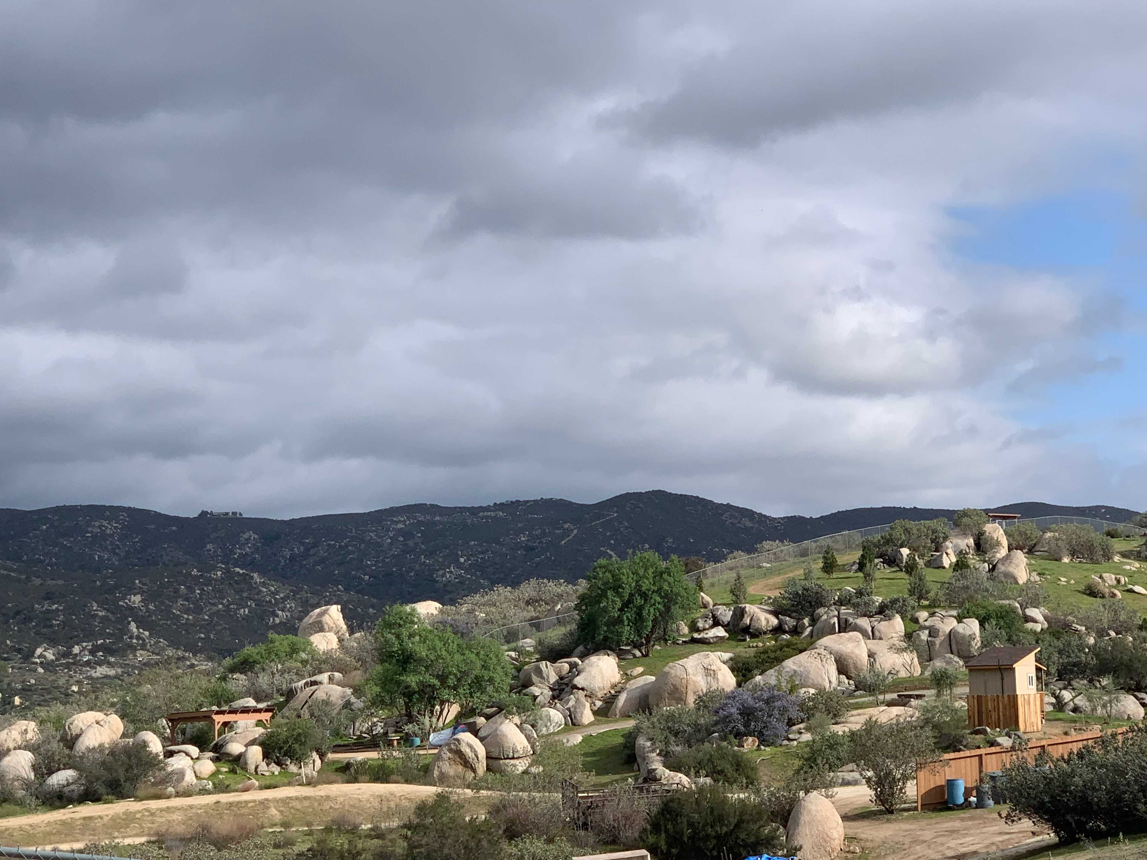 Opposite view of our campsite. Picnic shelter (on left), bathroom (on right) - our tent is silver/blue in between