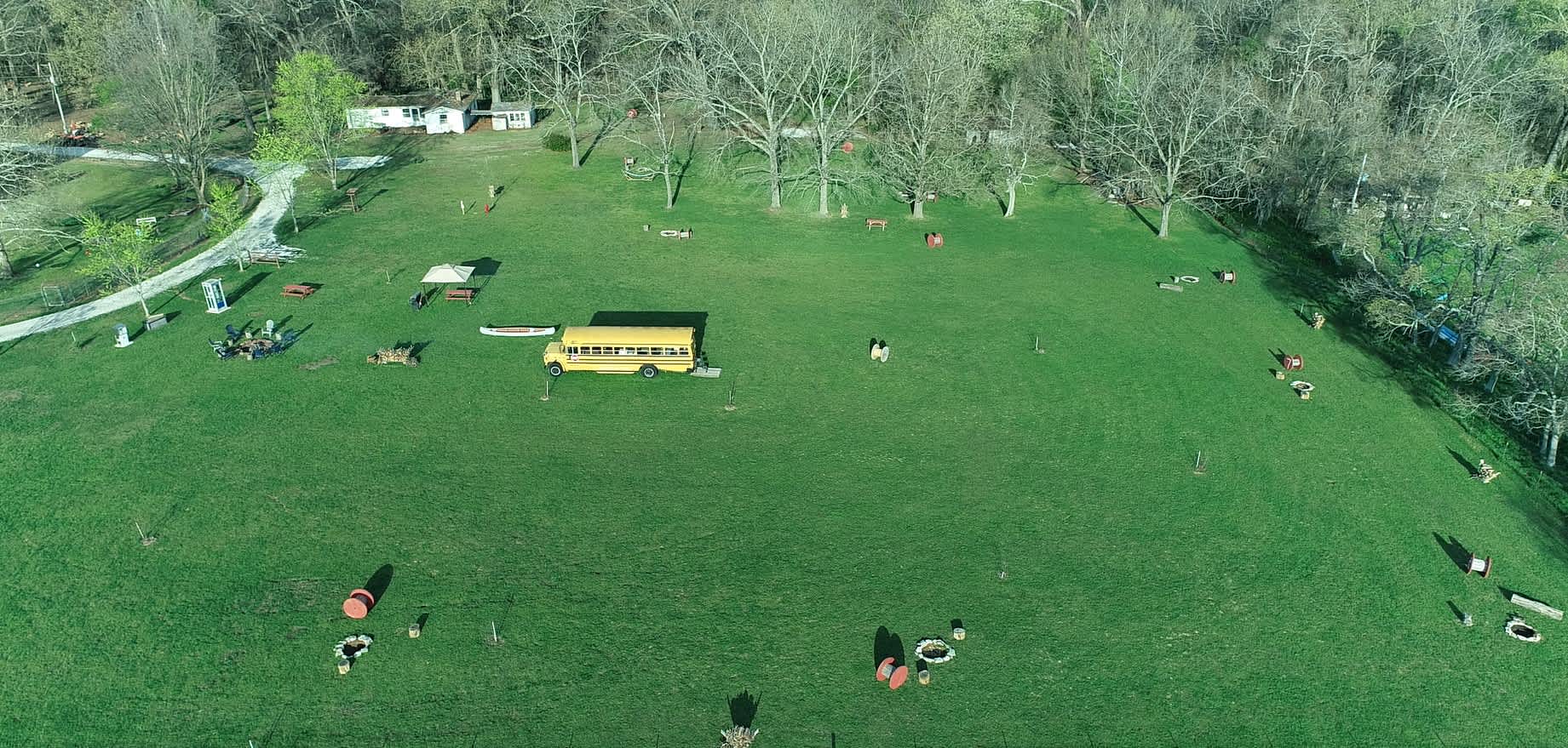 April 9, 2025 Aerial of Pea Ridge Bike Camp from the back of the property showing the community areas and Campsites 2- 10