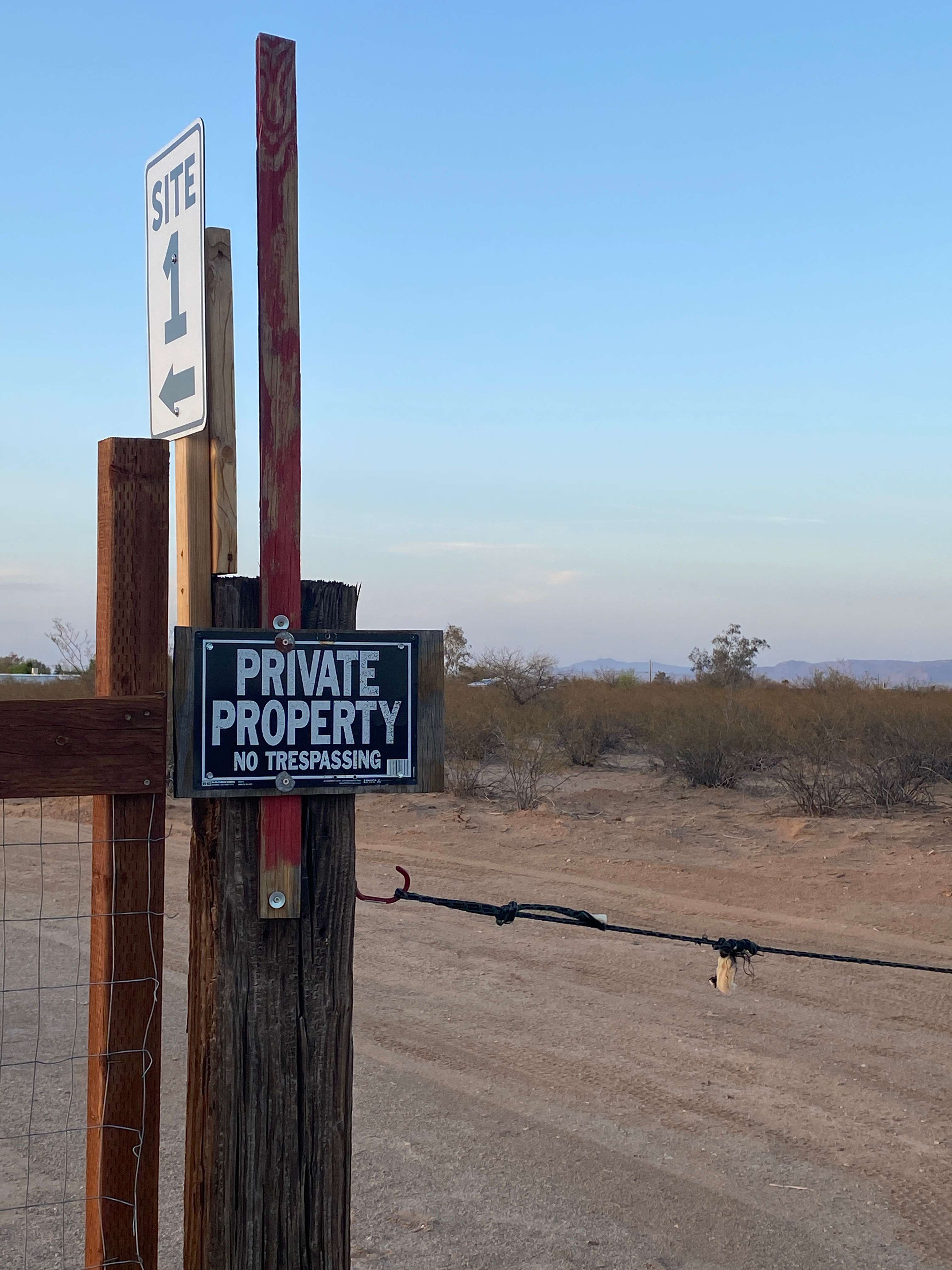 Entrance with rope and sign