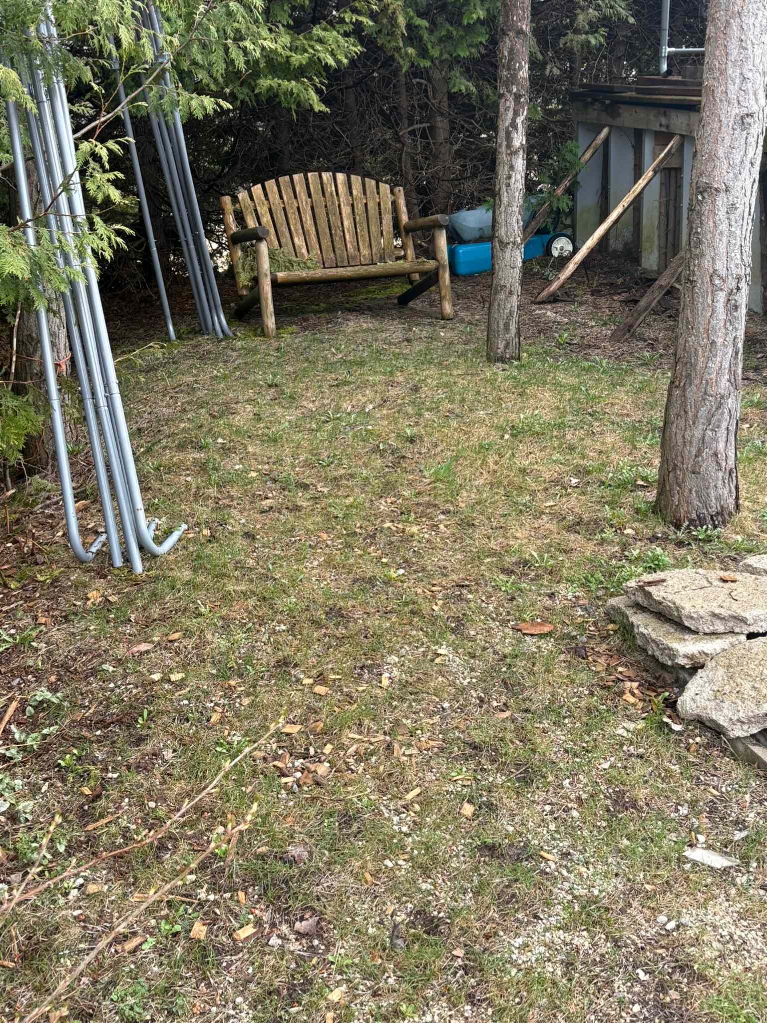 This site is a compact little sheltered space room enough for a small tent.  You will have access to all the lakefront amenities via our well travelled footpath.