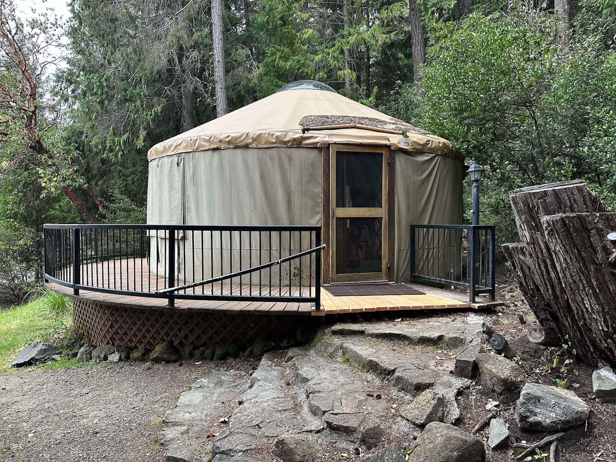Outside yurt (fire pit and chairs are behind)