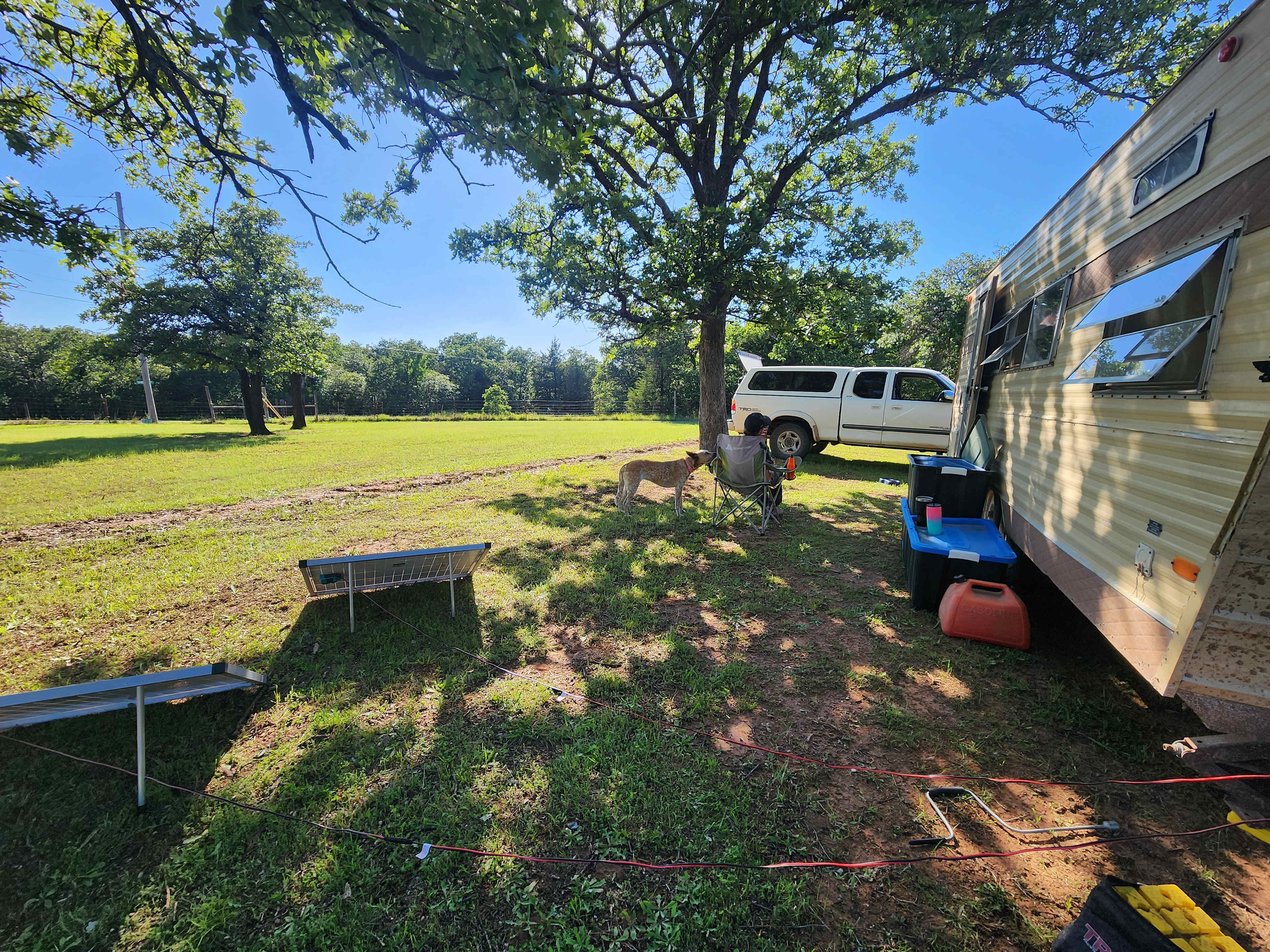 A bigger view of the fenced in field parking area 