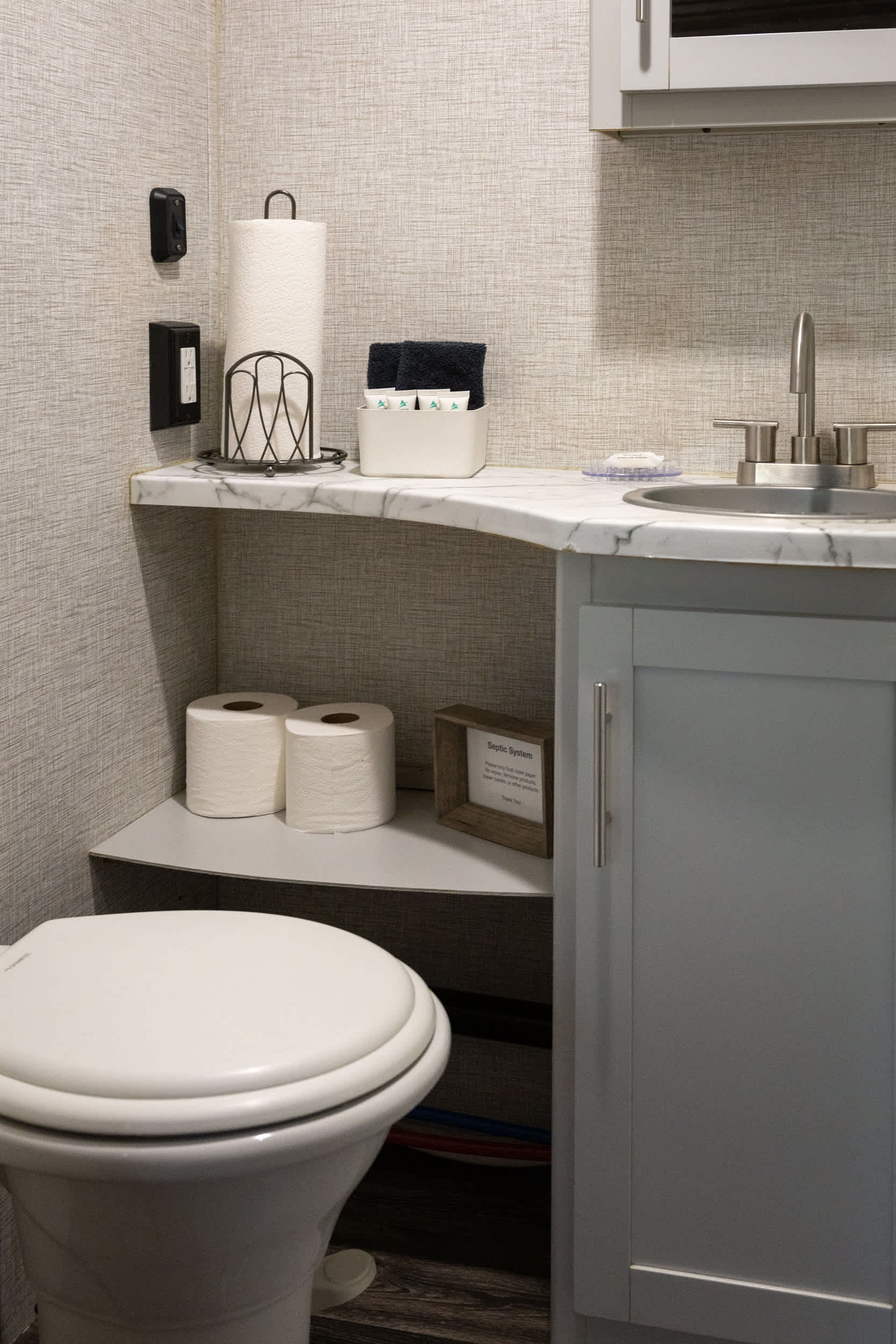 The bathroom is small, but comes equipped with everything you might need.
