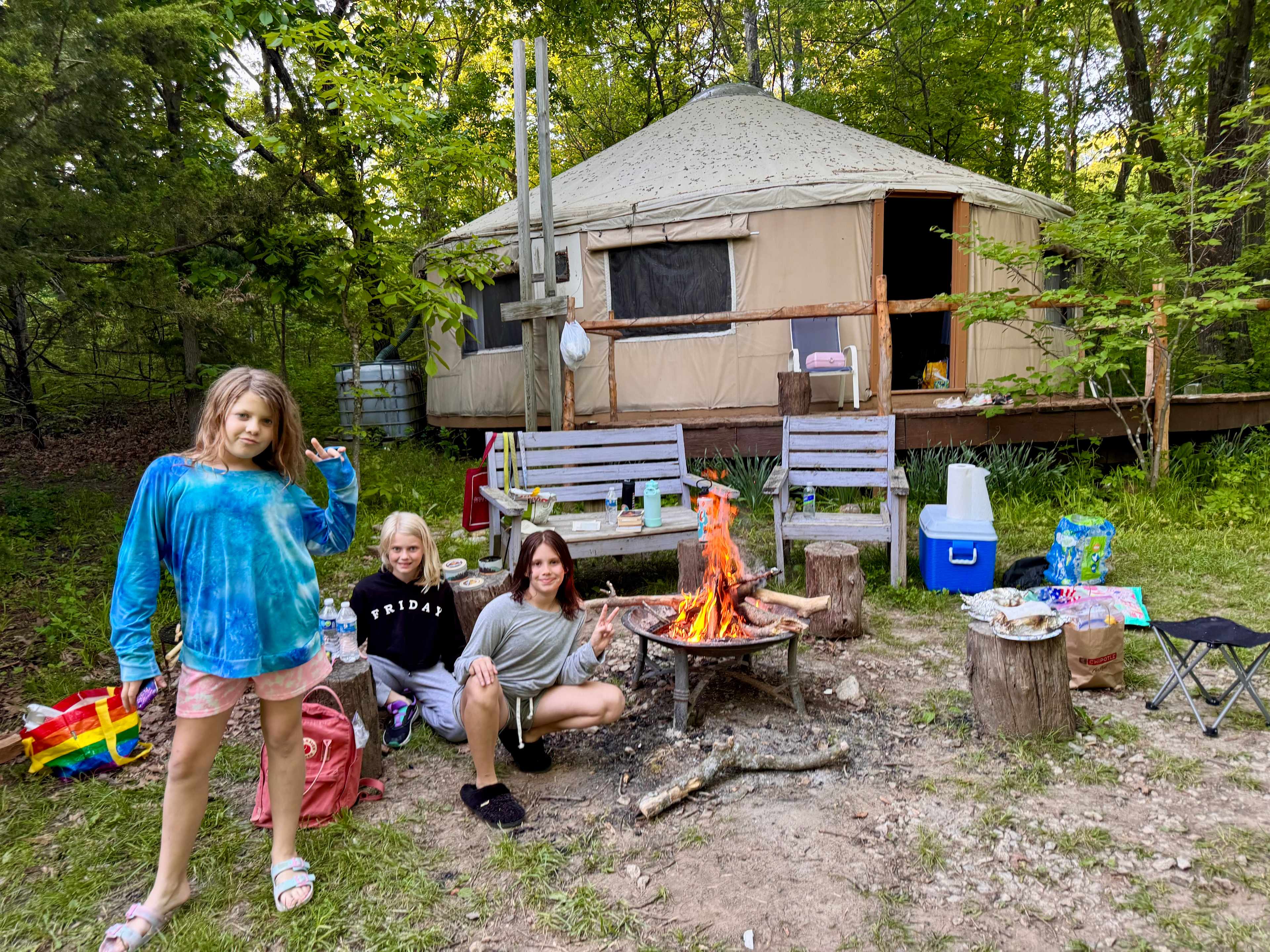 The yurt is perfectly set up for privacy, direct access to hiking trails, with a fire pit and seating ready for guests to use. 