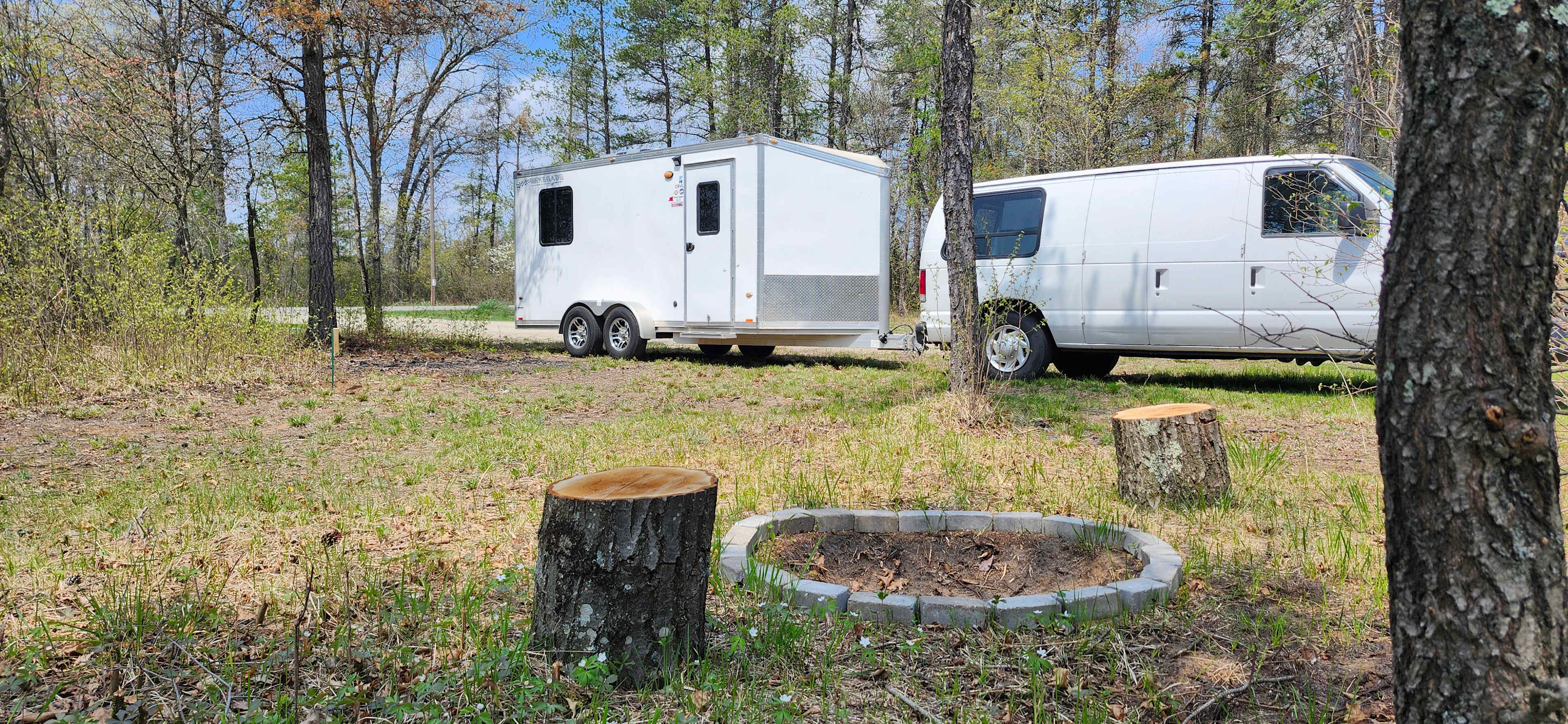 Fire pit and view of where you would park if pulling through the site.