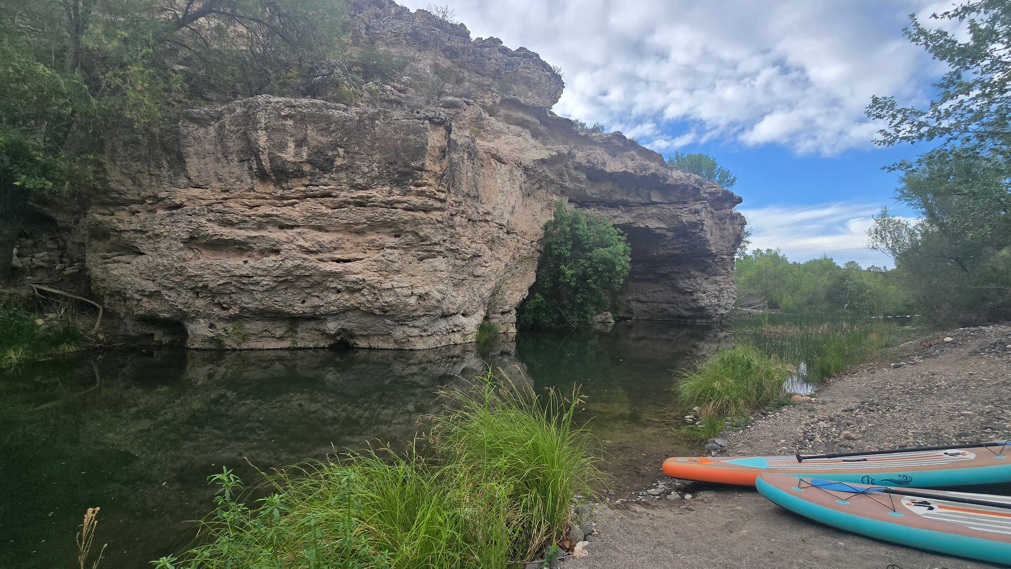The peaceful creek with paddleboards