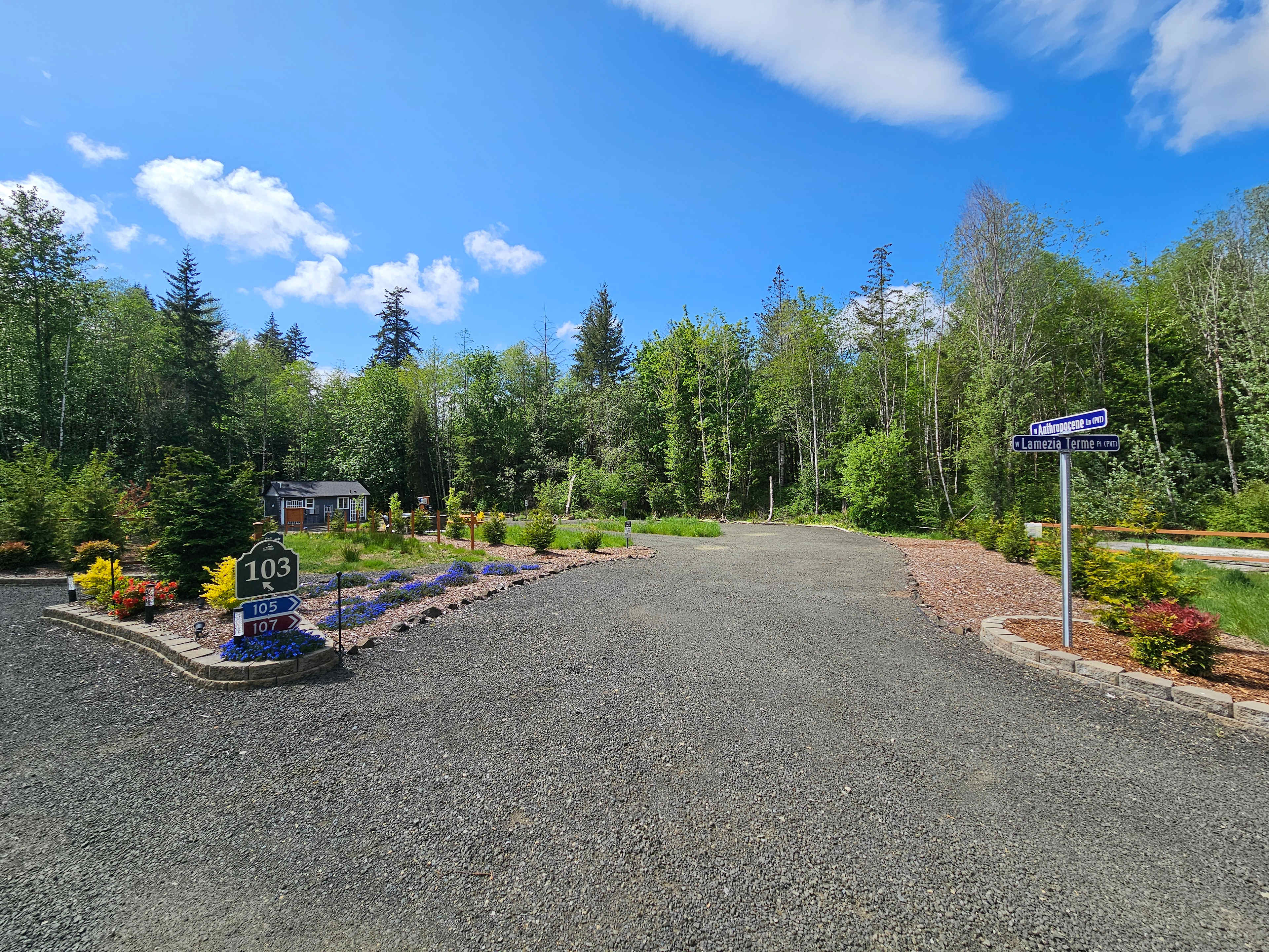 The first driveway curve is over 18' wide at its narrowest.  From here, the RV site can be accessed as pull-in/back-out.