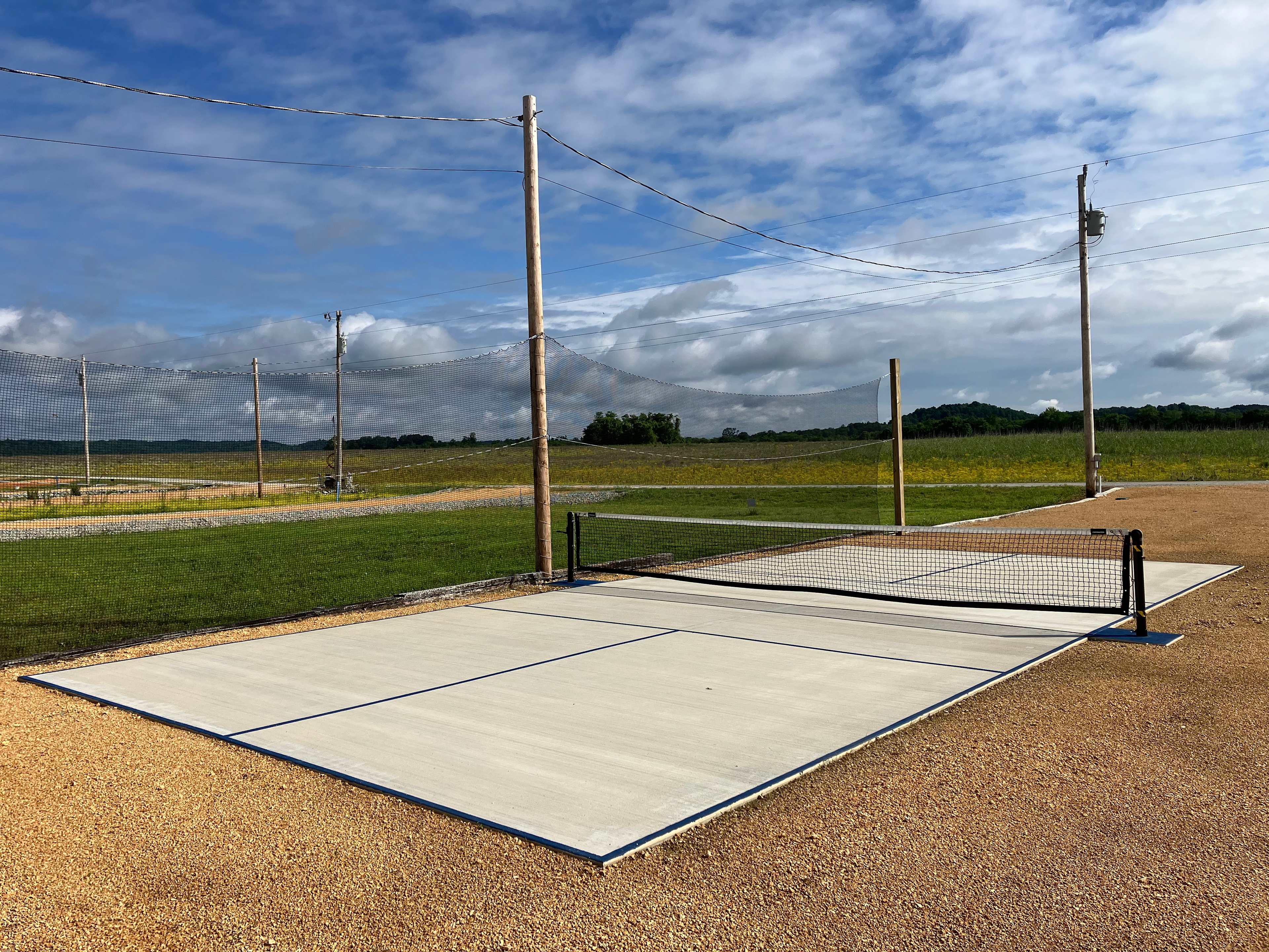 Pickleball court with catch net.