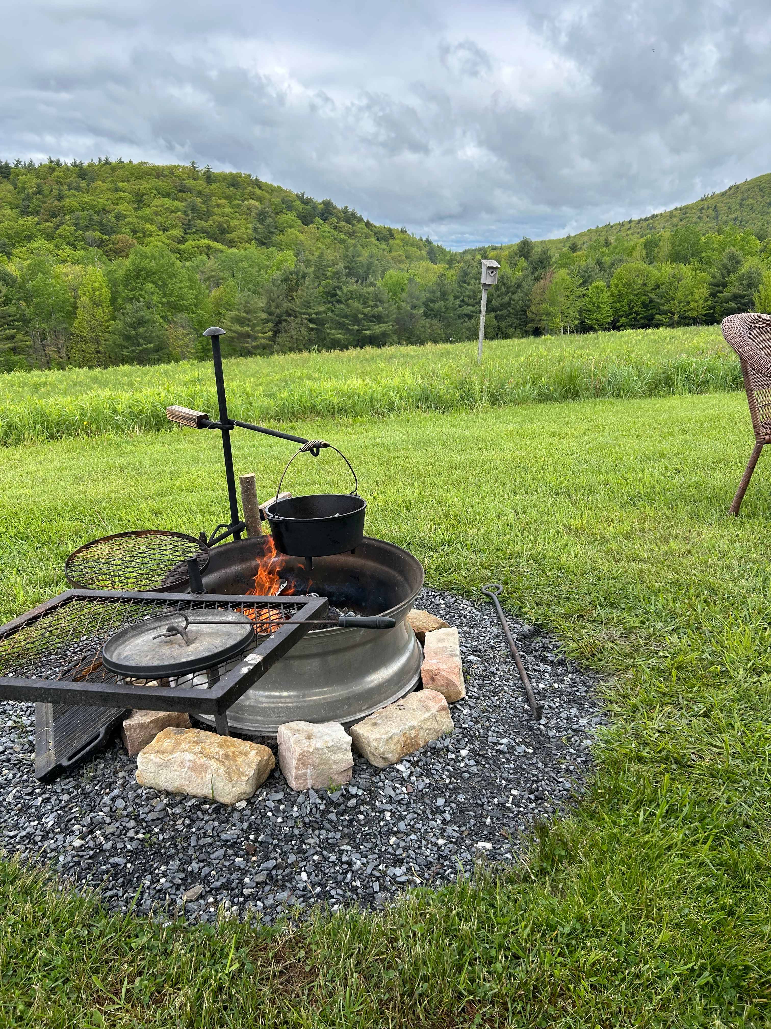 Cool camp fire set up( pot was ours but it had a place to hang)