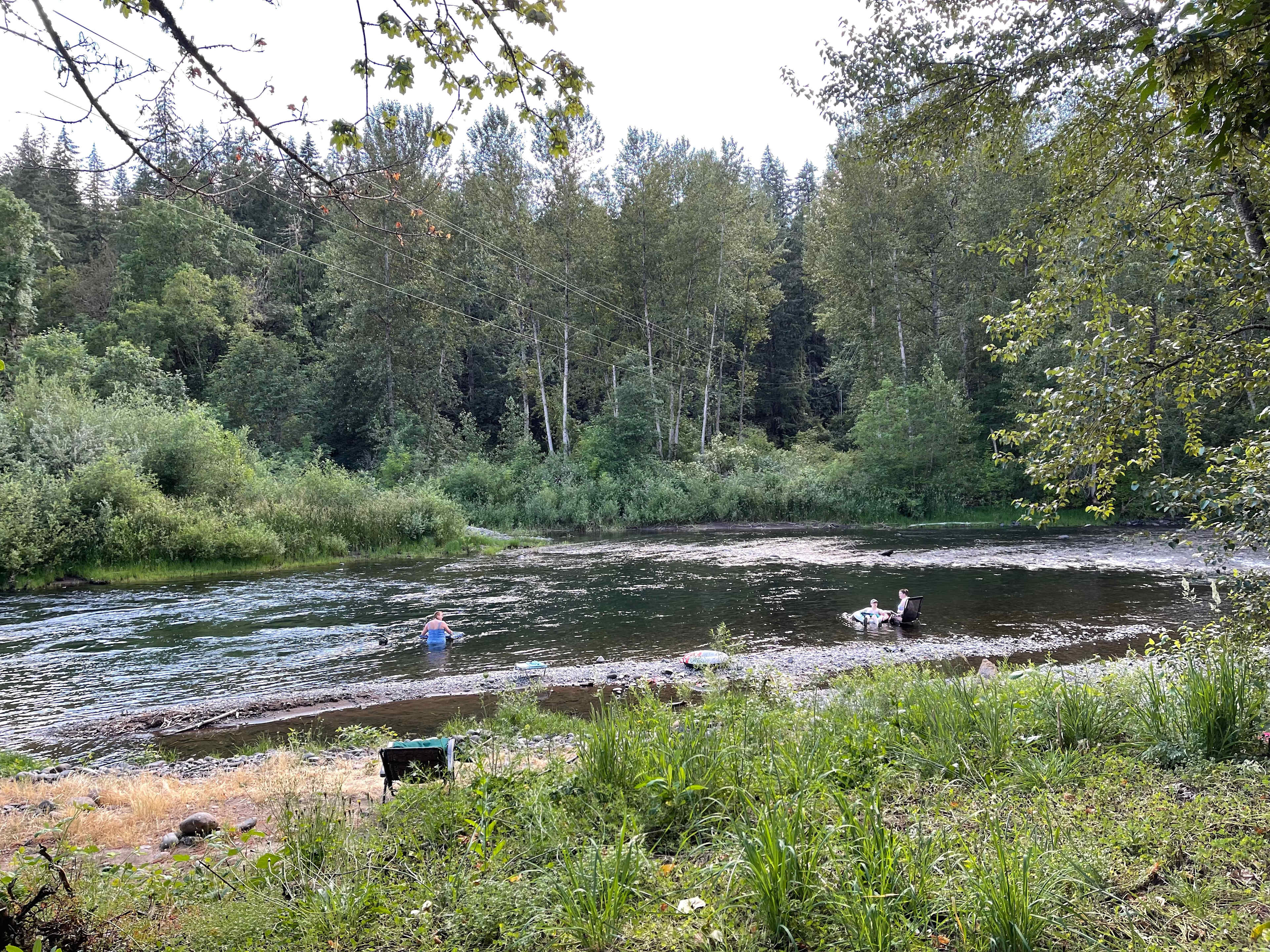 People enjoying the river.
