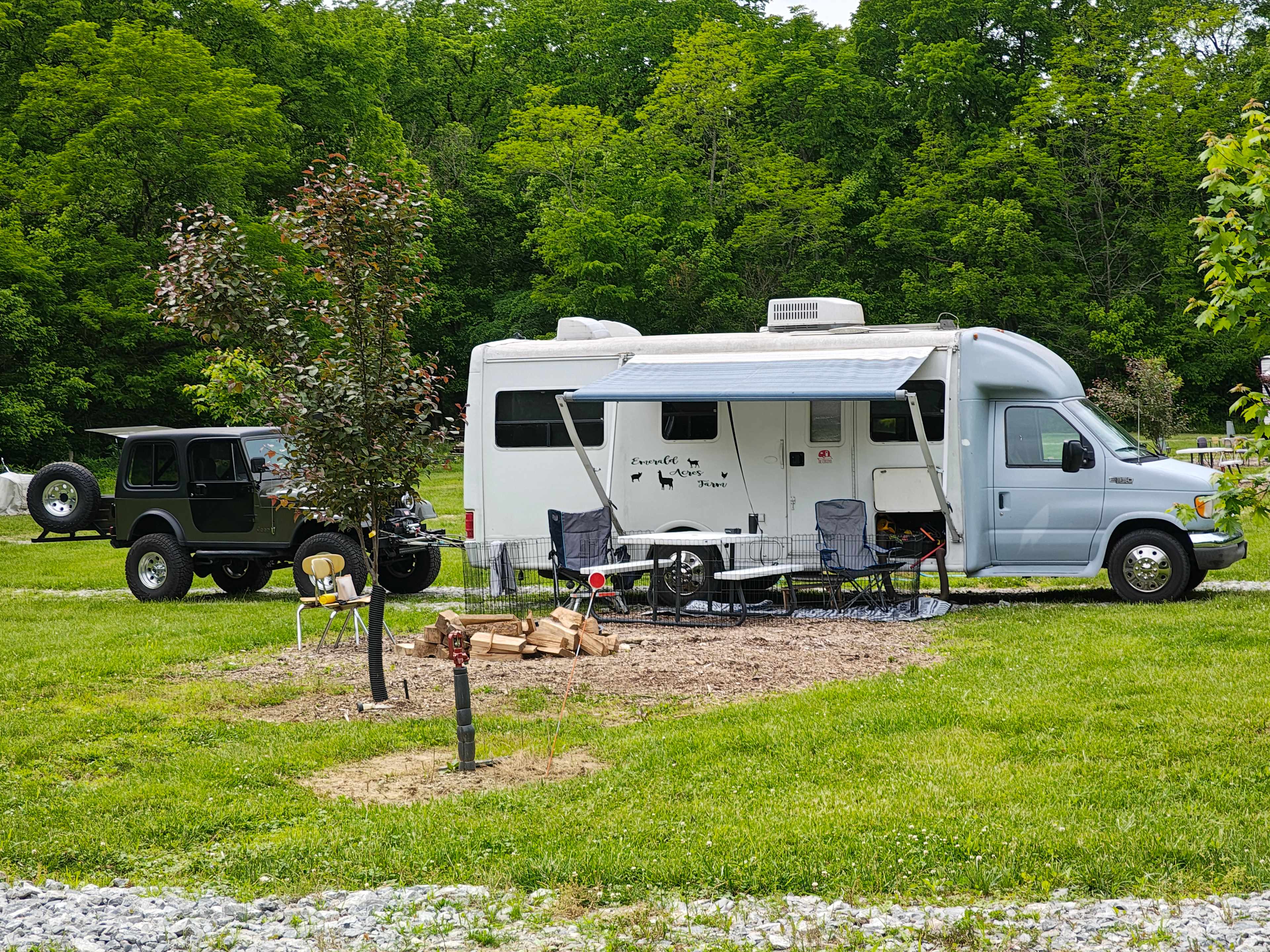 RV Spots; many lined up in a row, drive/pull through and pretty lengthy.  Water and electric, porta-potty available.