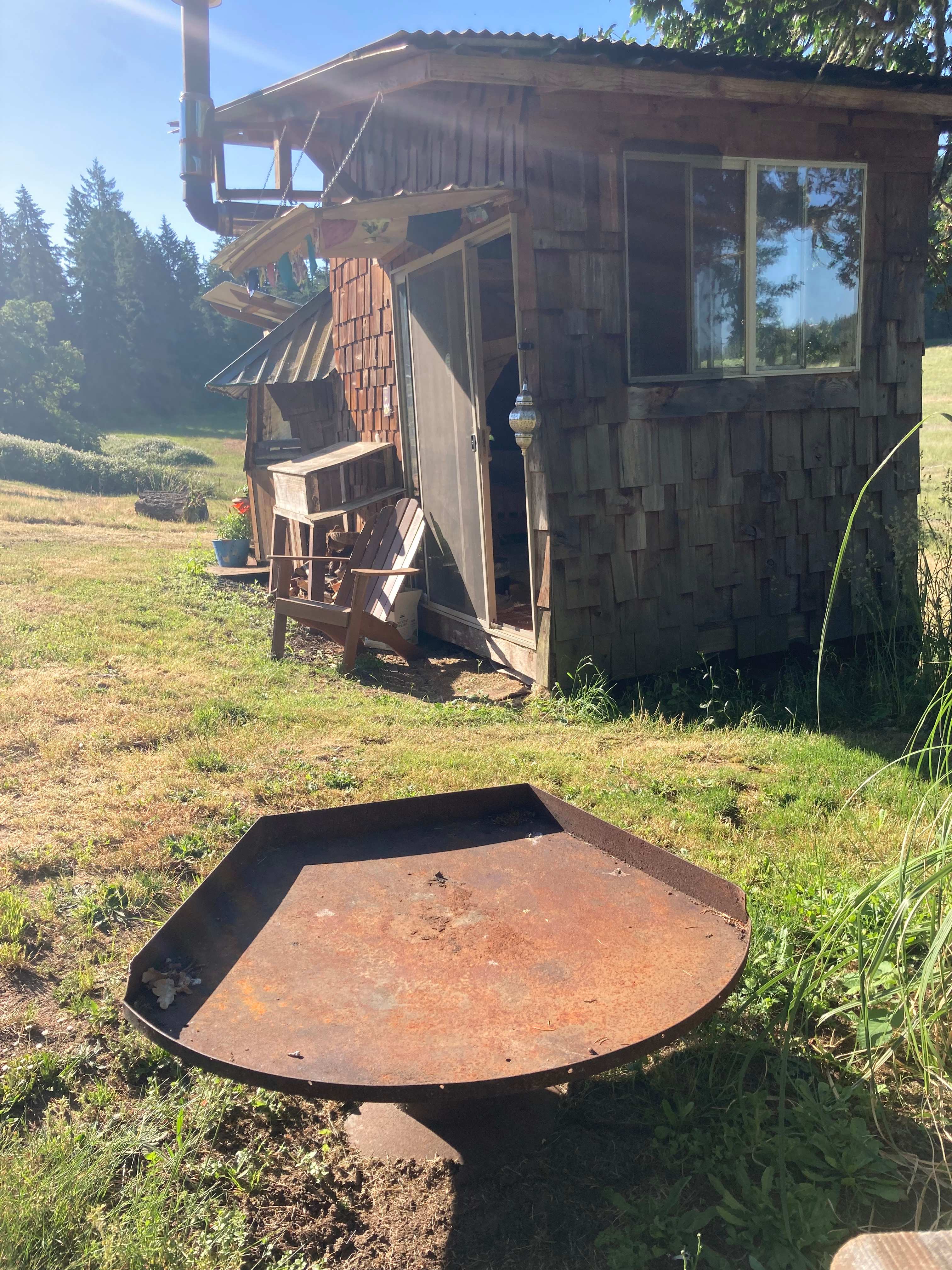 Outdoor seating and grill. 