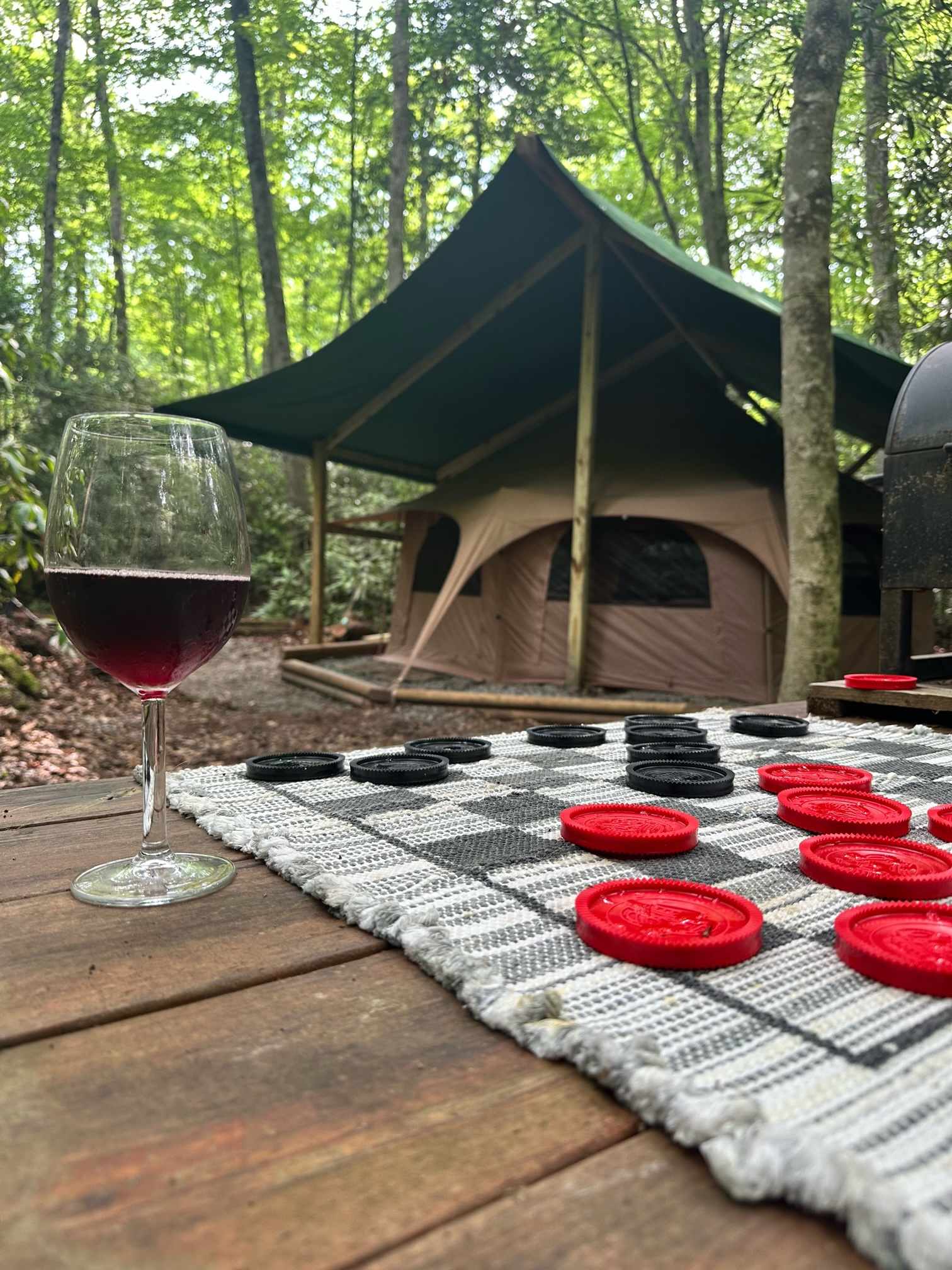 We added an additional canvas top to keep you completely dry and sheltered. This site is totally private among the rhododendrons and has a creek you can hear while sleeping. 