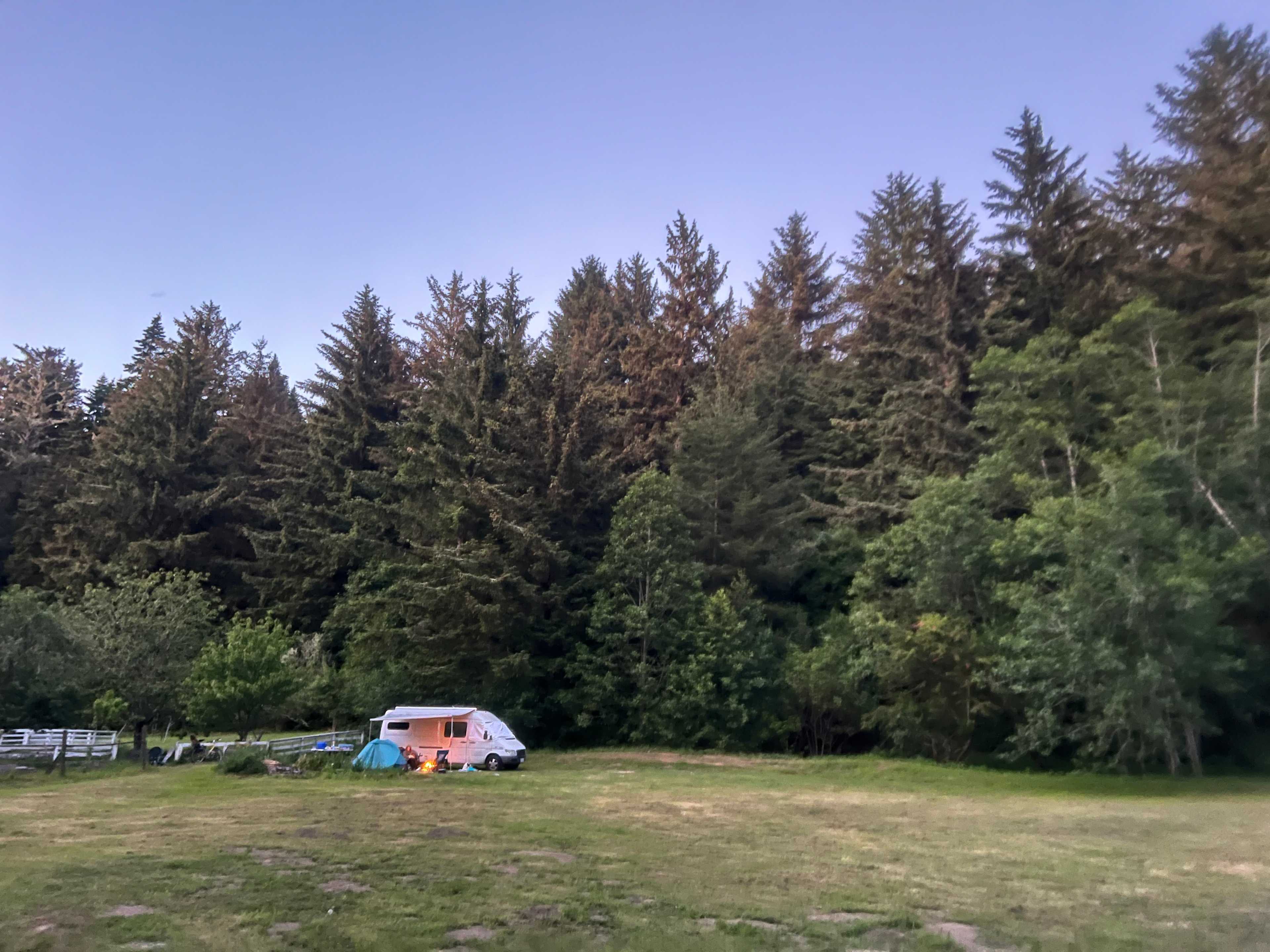 Creekside, next to the house, other campers across the large field. High top sprinter needed caution when driving down the road with low hanging branches. 