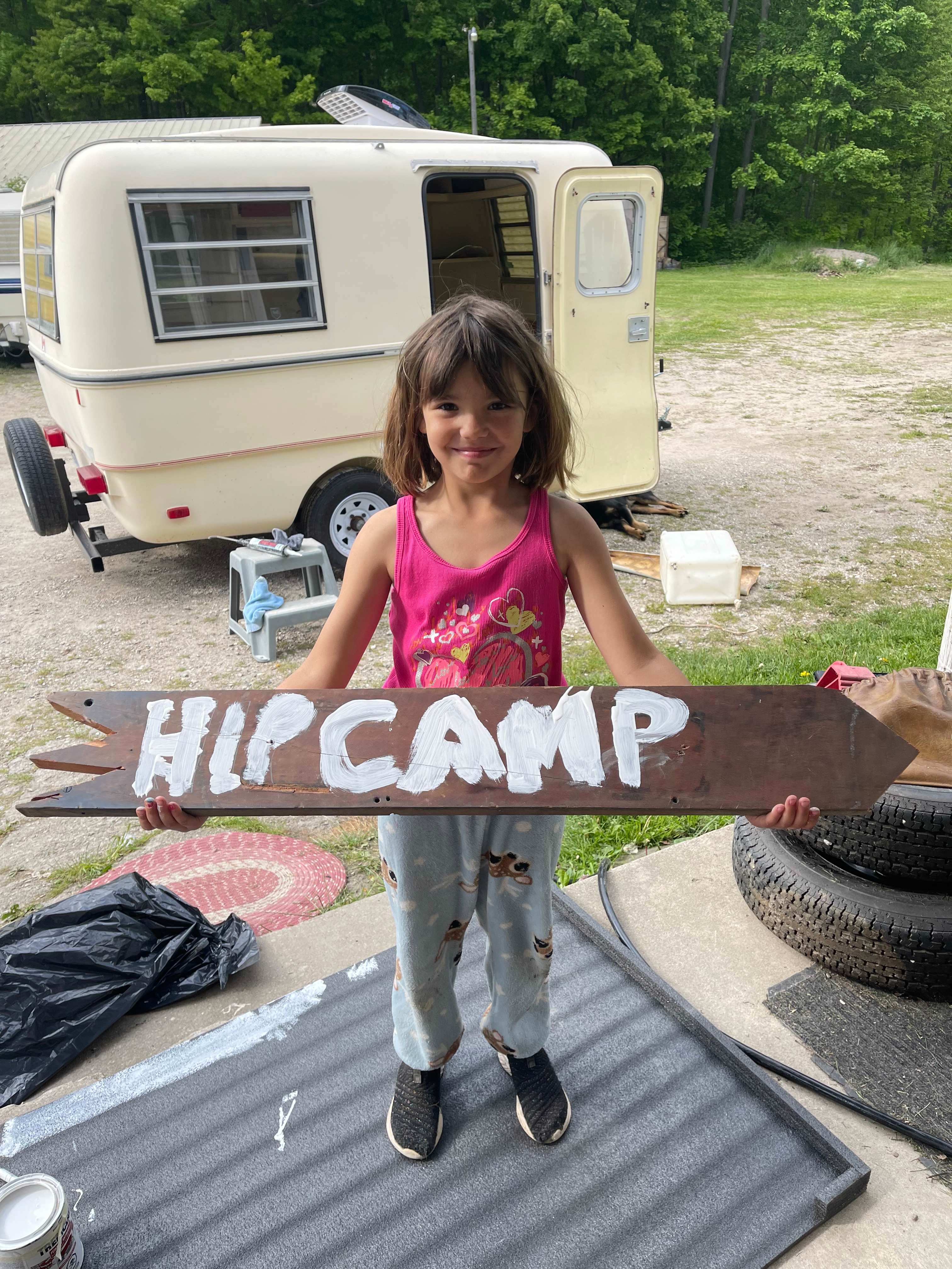 Sophya one of our very first campers. She made our sign. 
