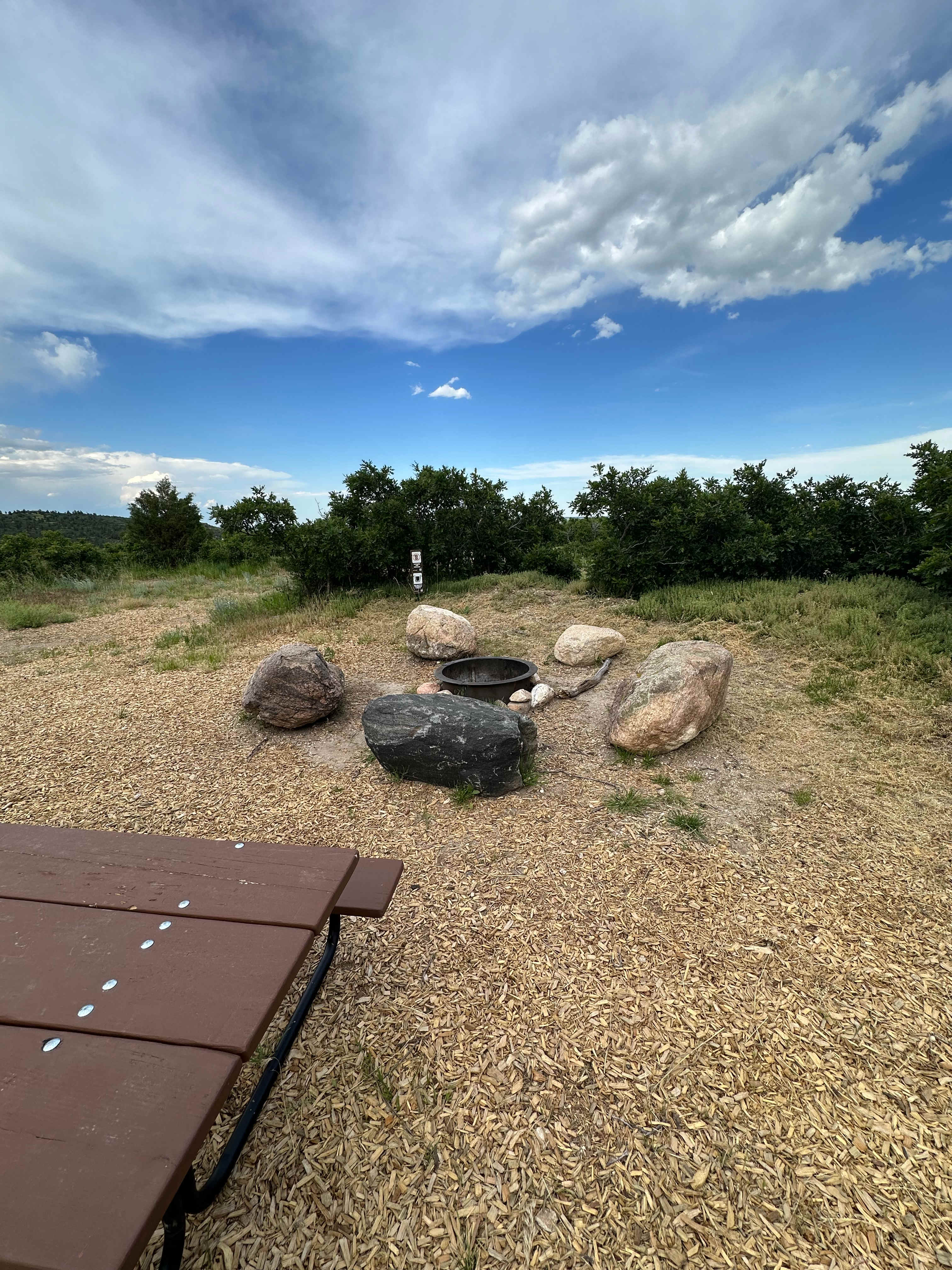 Great fire pit and picnic table.