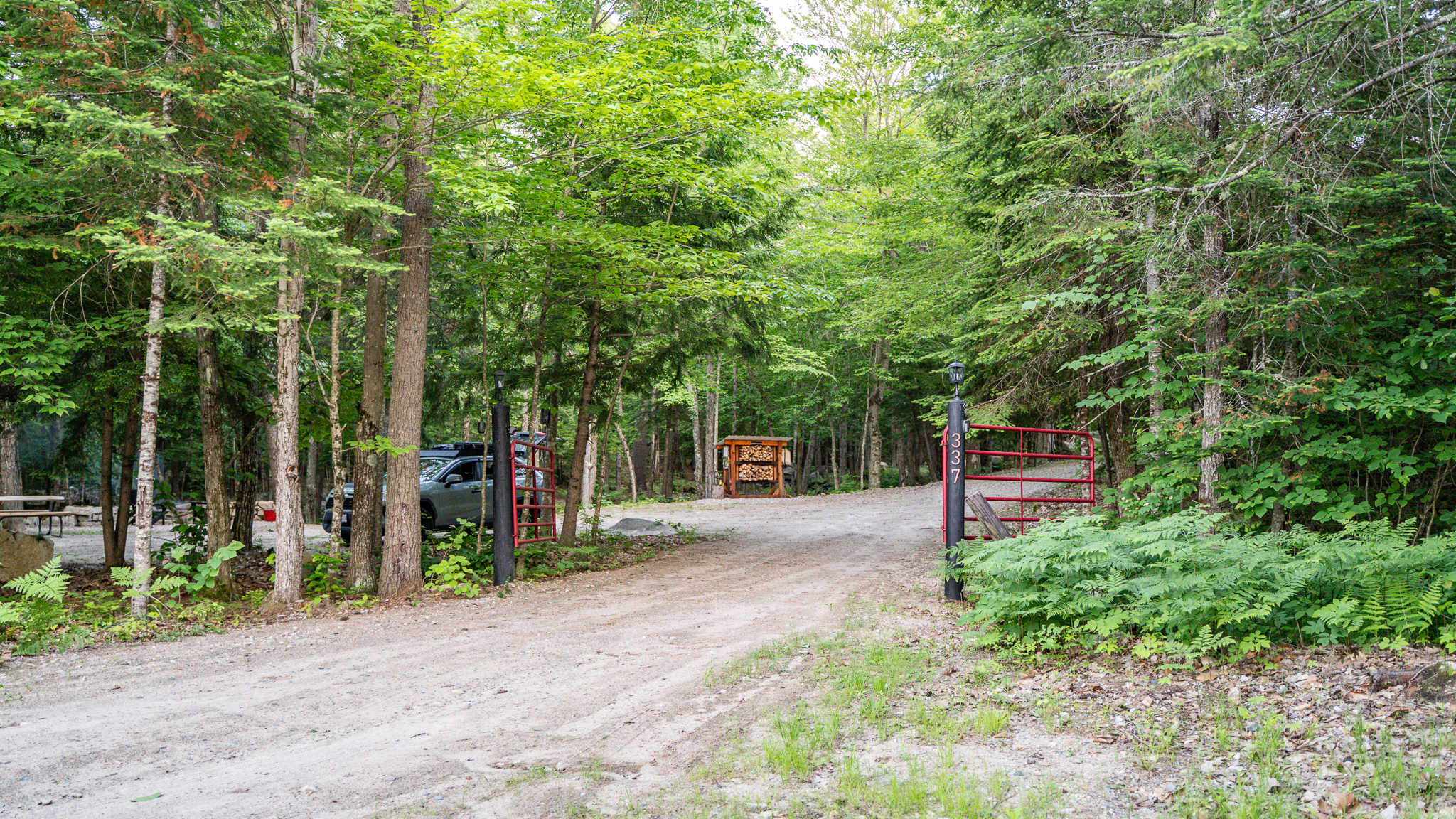 Driveway entrance is wide enough for standard vehicles and trailers