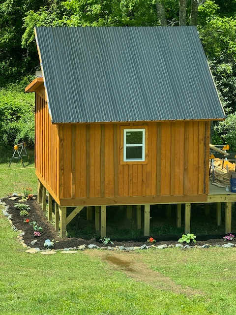 The Cozy Bear, by the stocked creek