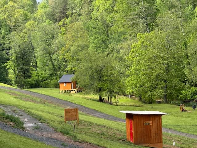 The Cozy Bear, by the stocked creek