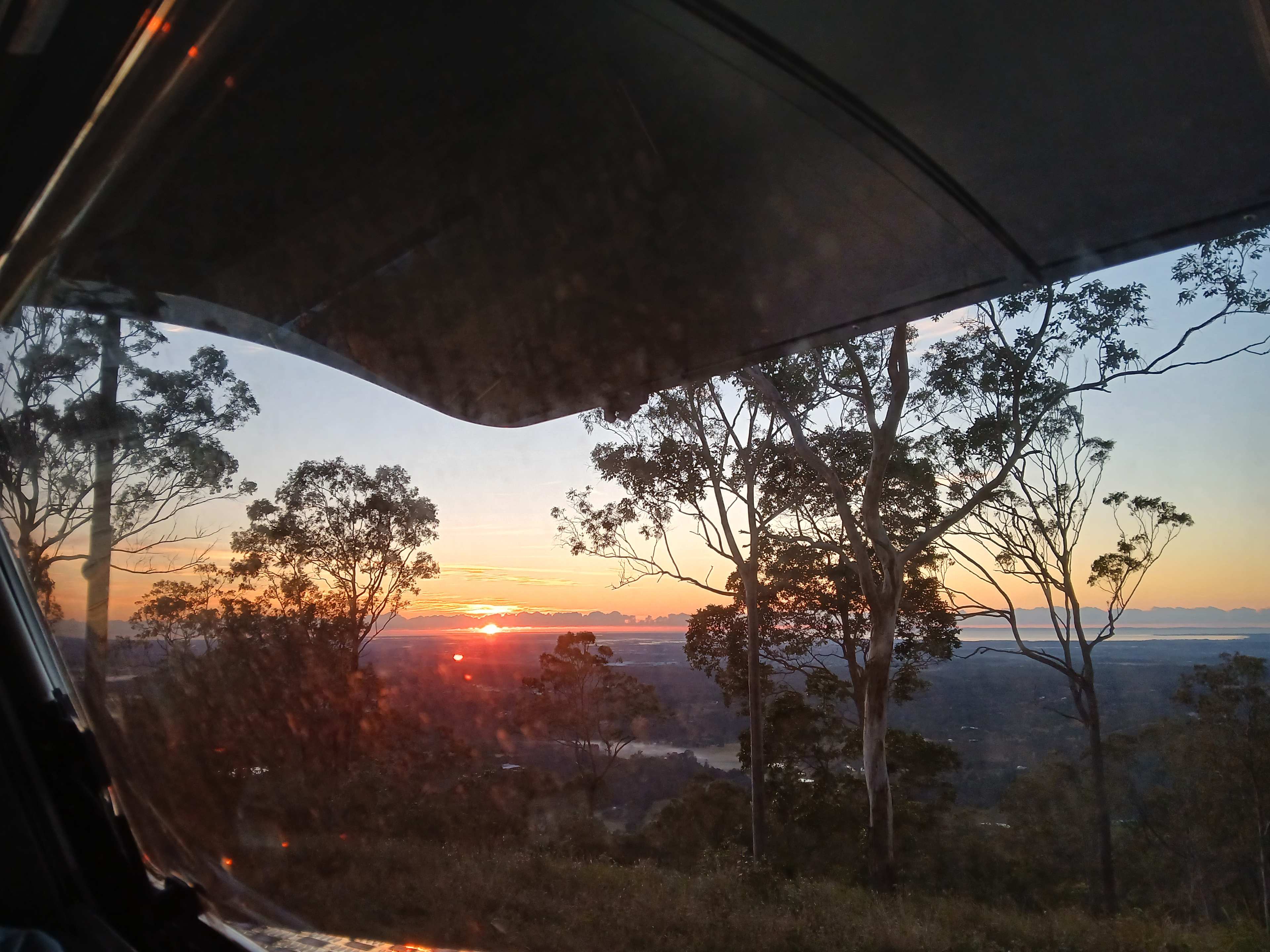 Looking out van window 