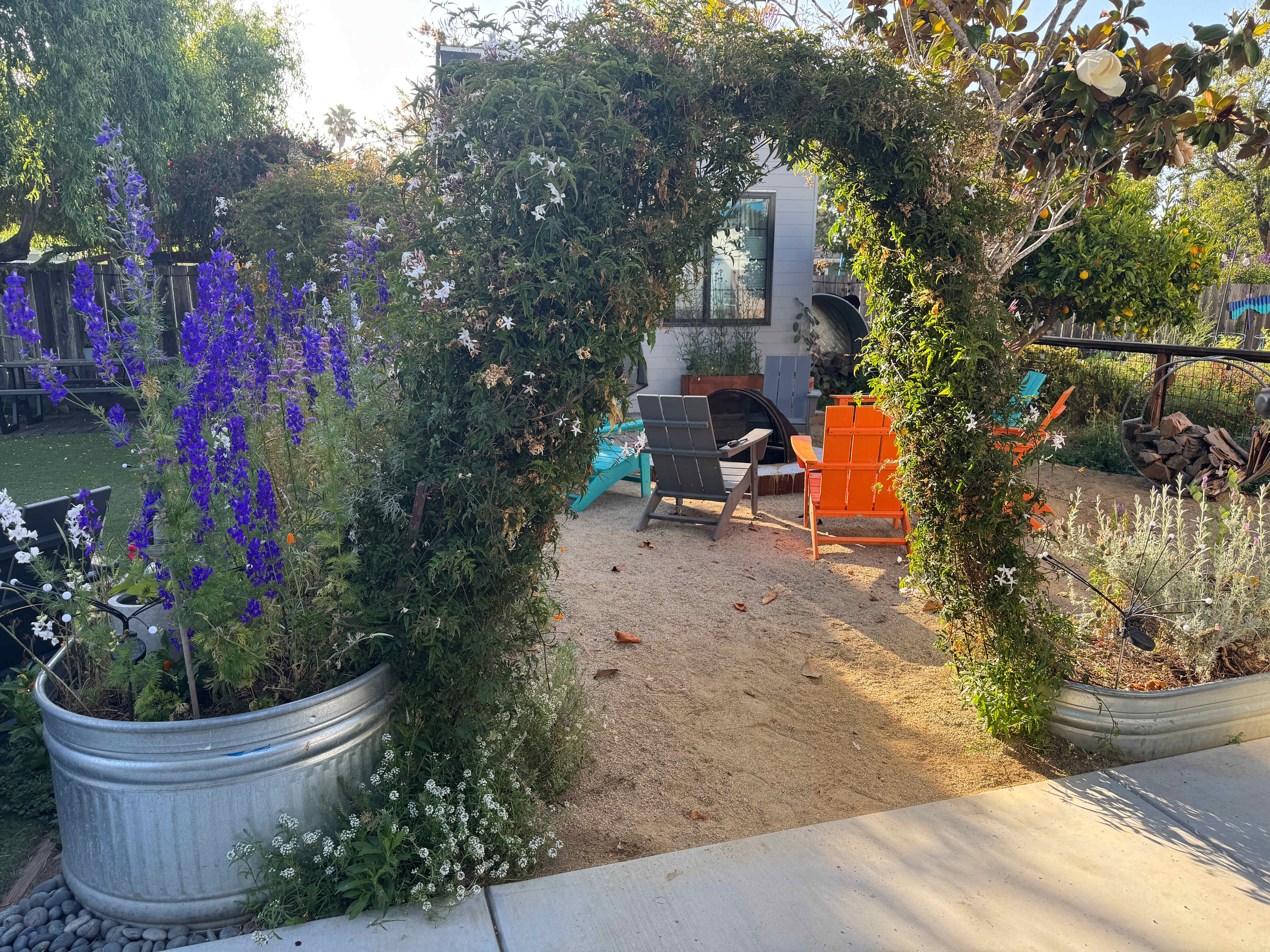 Lush view from our Airstream into the 'Meadow' with firepit
