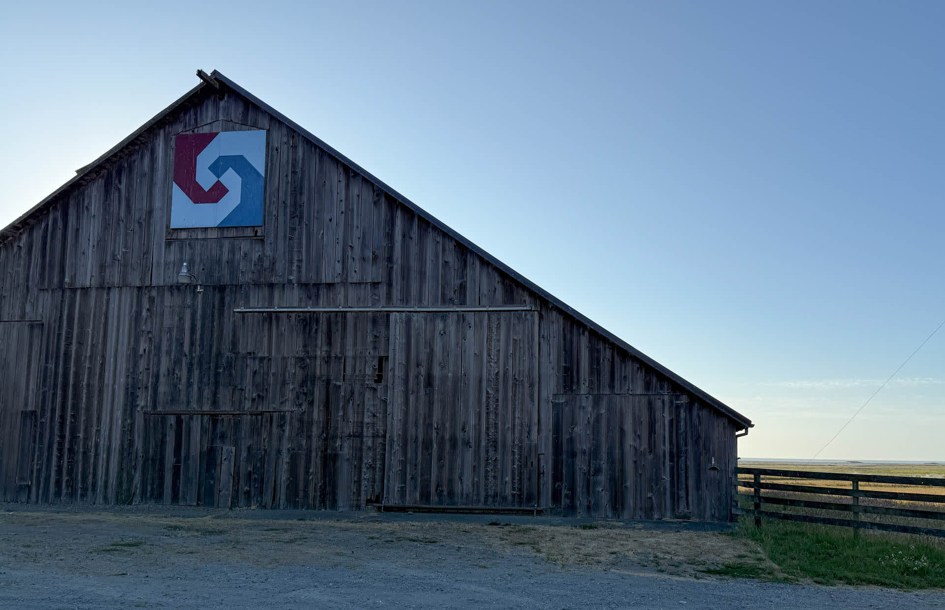 My interpretation of the nearby barn:  "Where land meets sea."