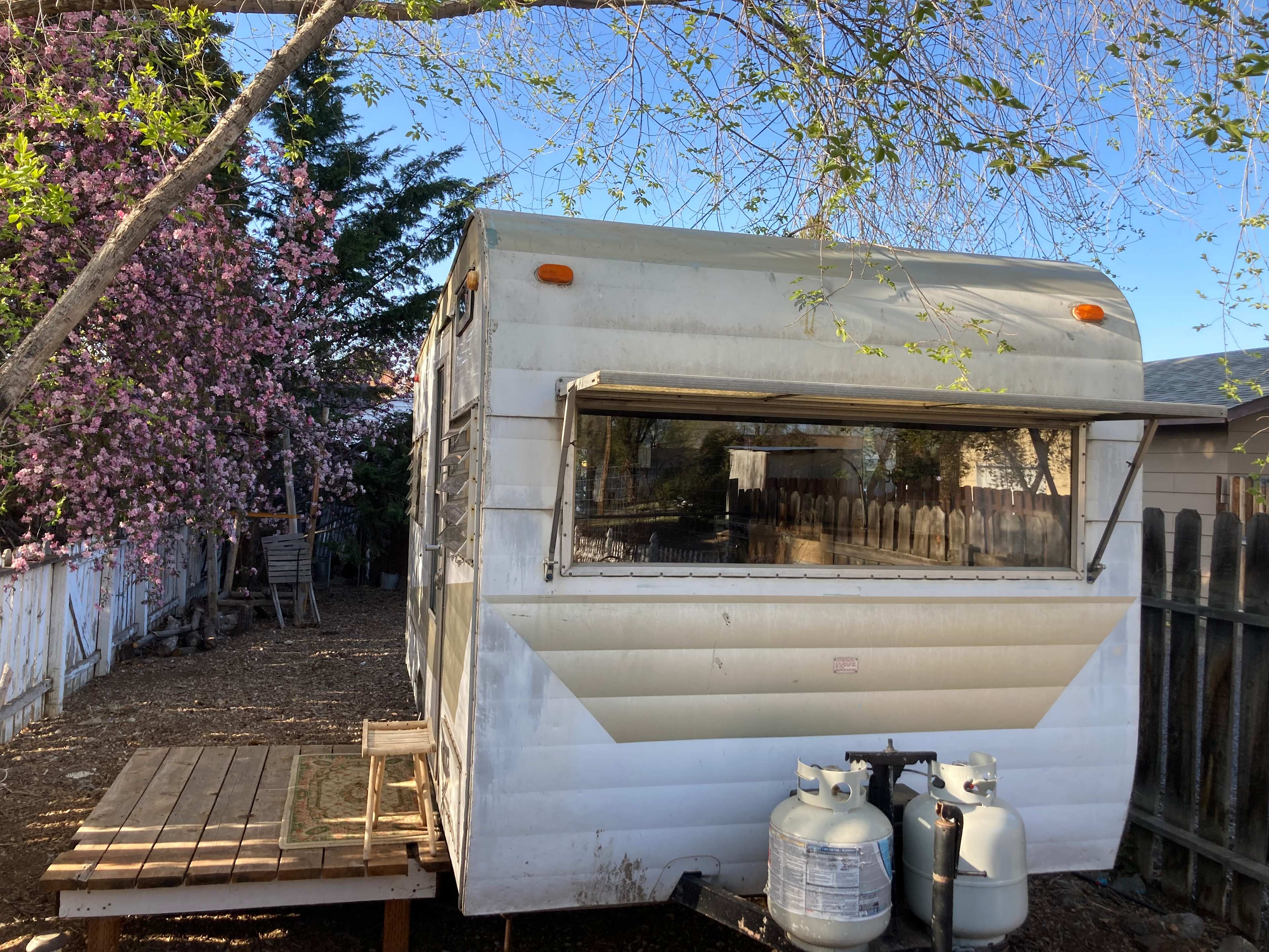 Front of trailer and a small porch. this is the entrance location for the property.