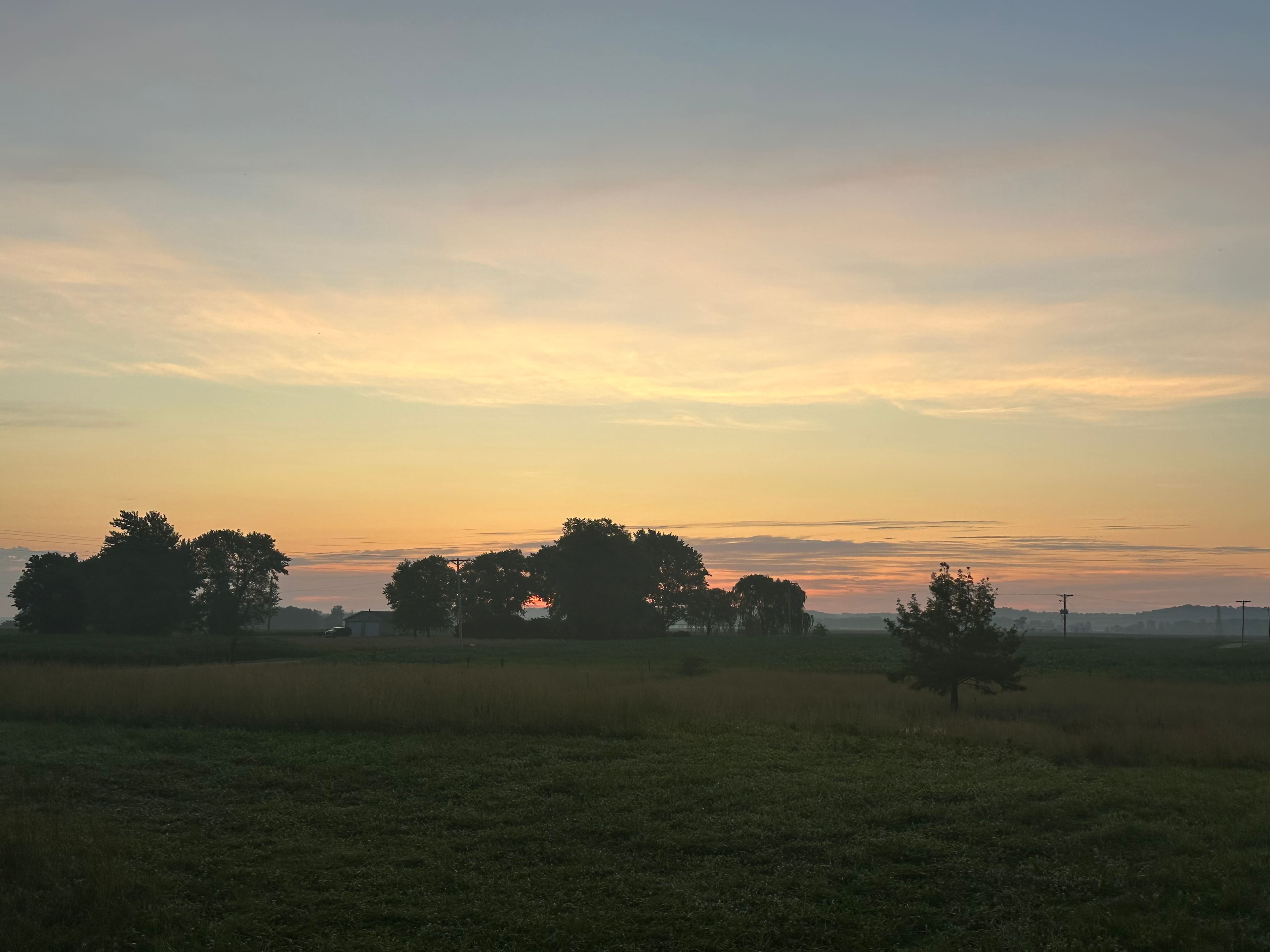 Beautiful sunrise at the grain bin. 