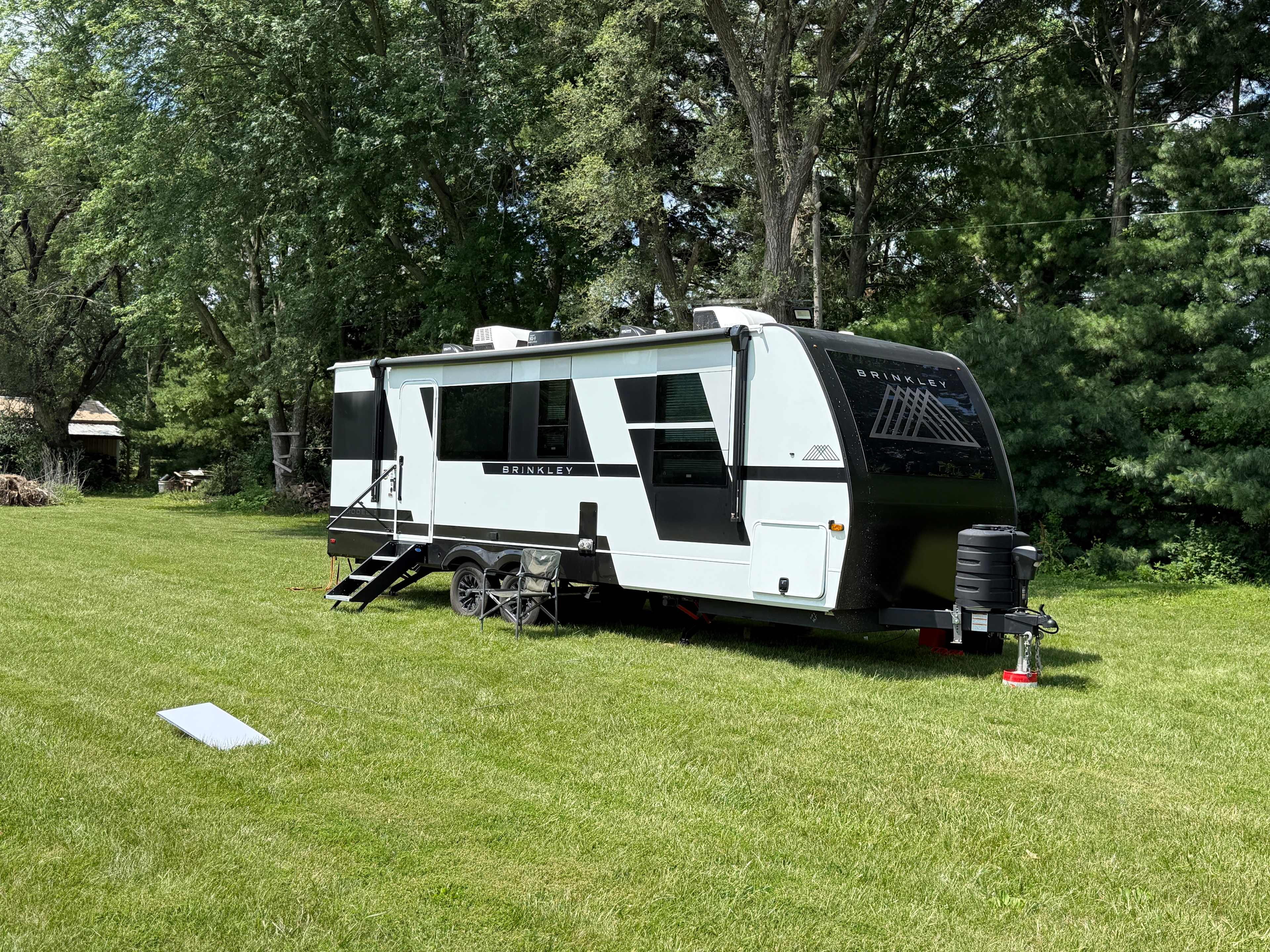 We camped next to the chicken coop behind our Brinkley.