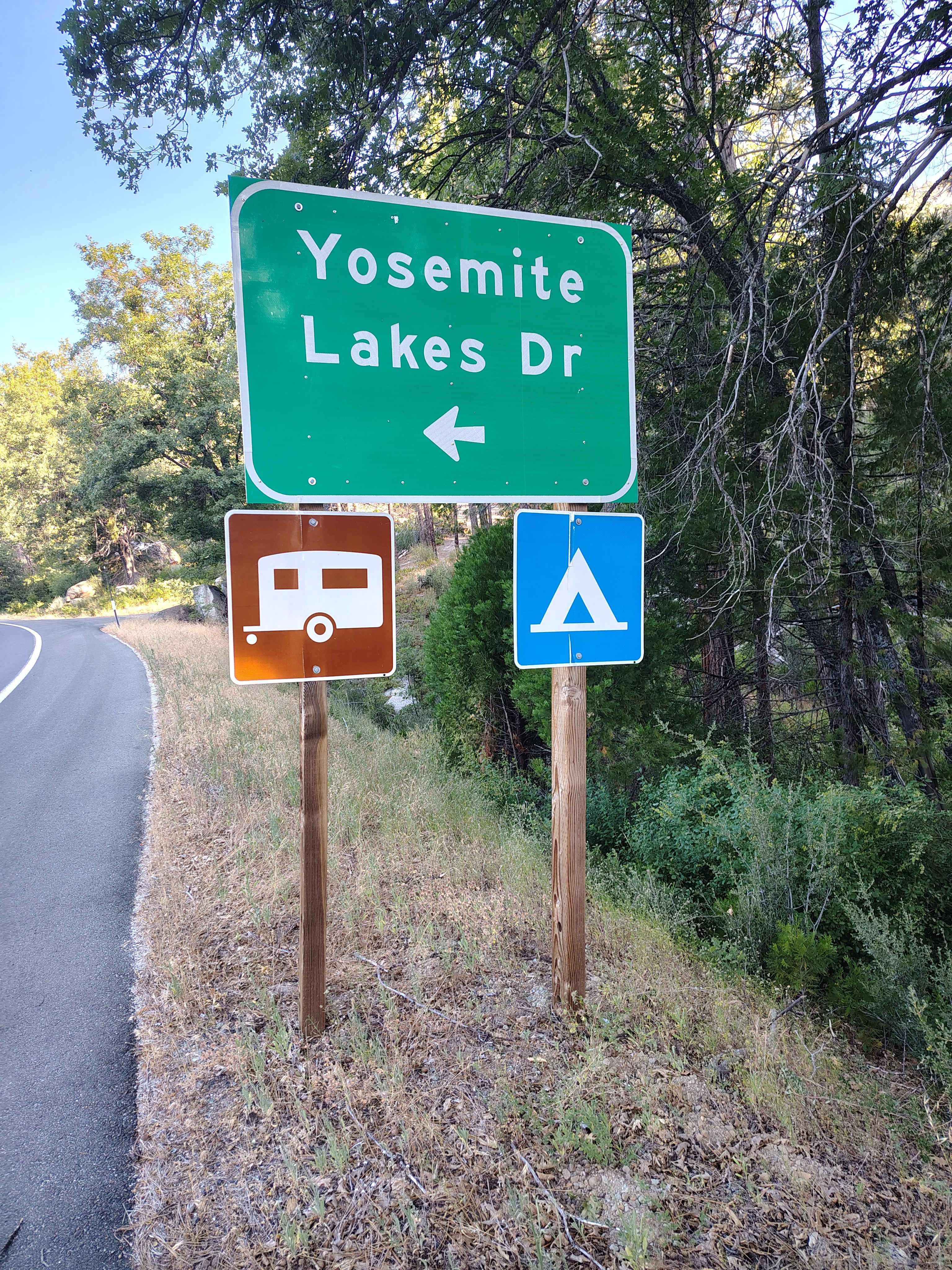 Coming from the east or Yosemite, first driveway on the right after this sign.