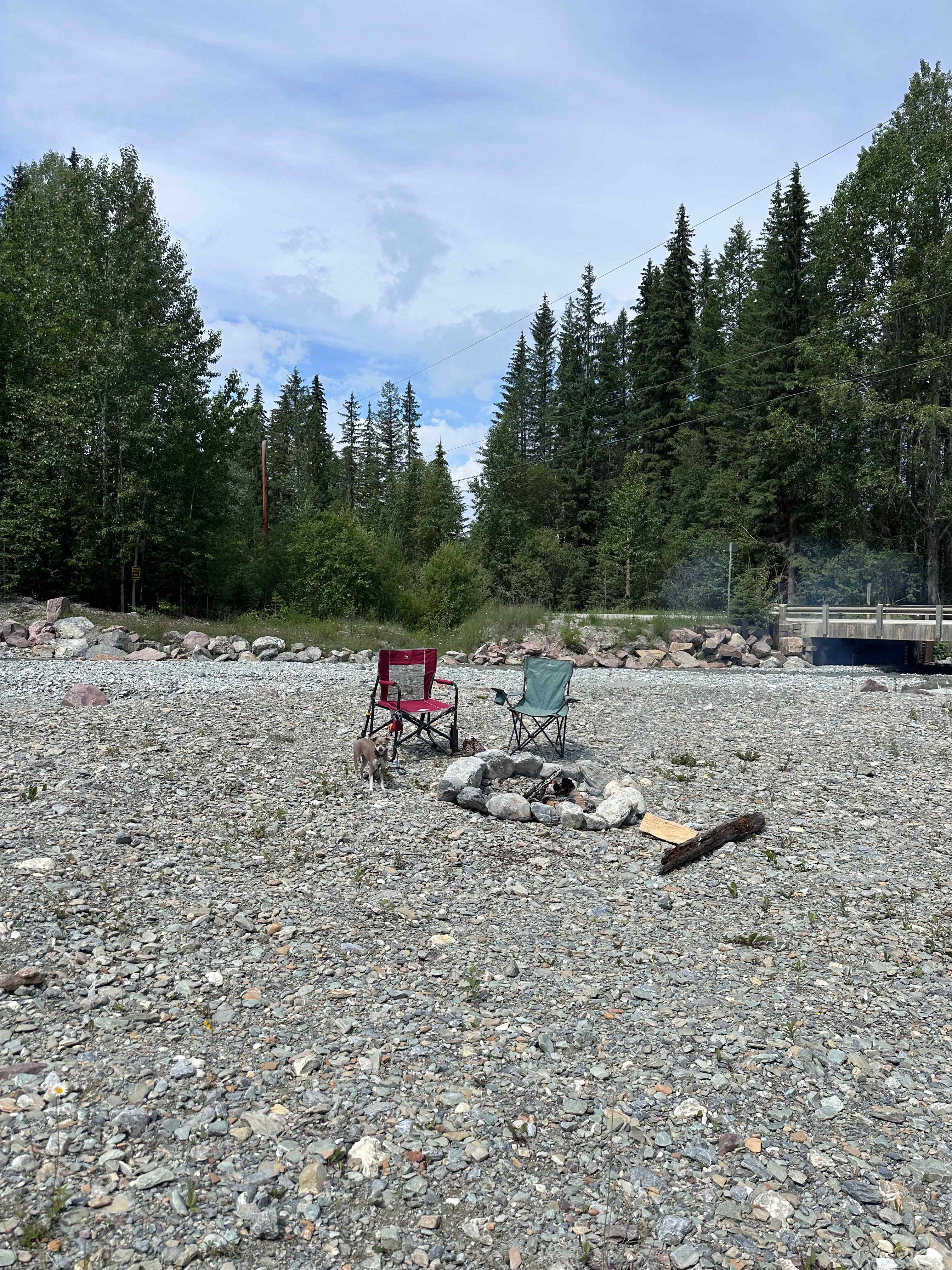 Close proximity to well-used gravel road & lovely creek