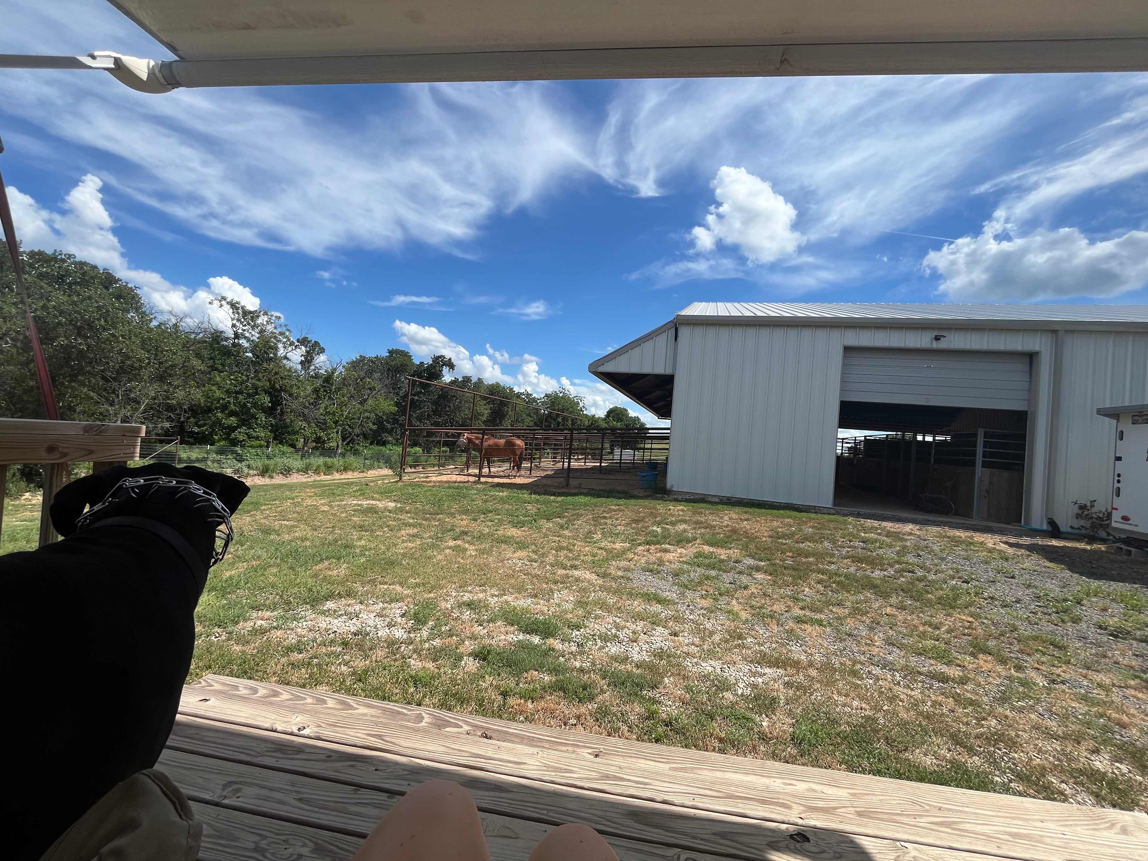 View from the awning covered deck on the smaller trailer.