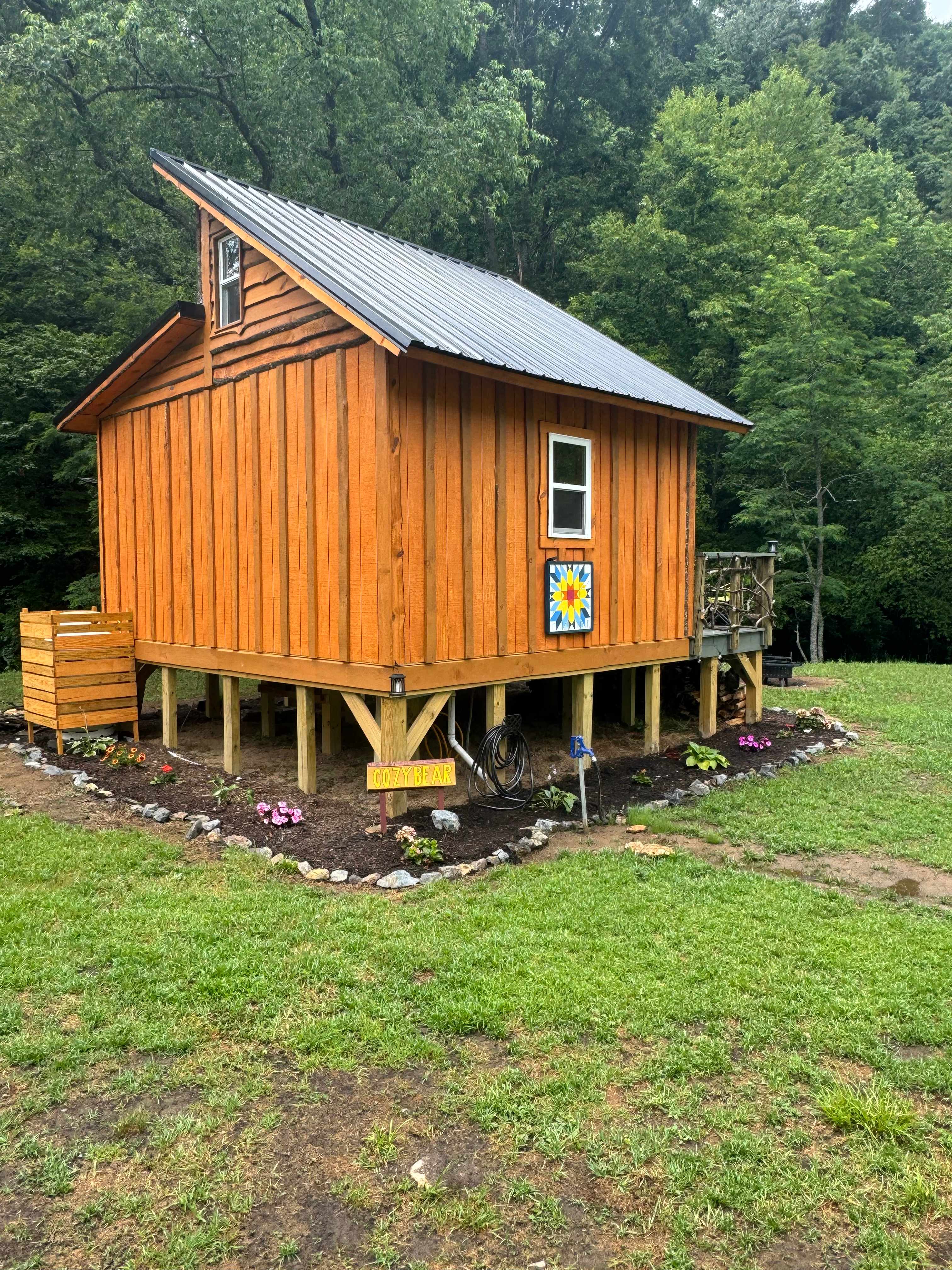 The Cozy Bear, by the stocked creek