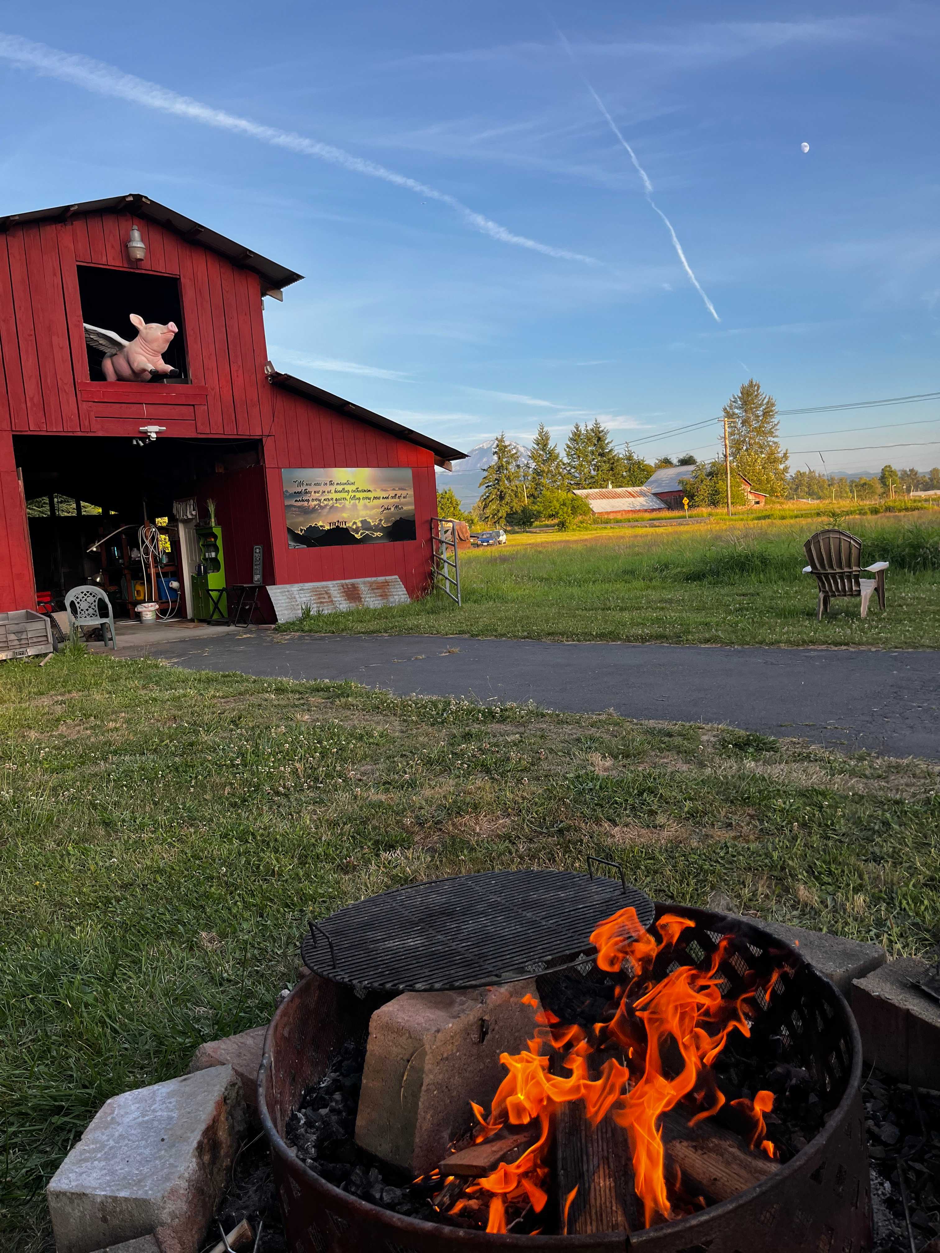 Making use of the fire ring on a gorgeous summer evening (bring your own wood) and eventually rigged the grill up to cook over it