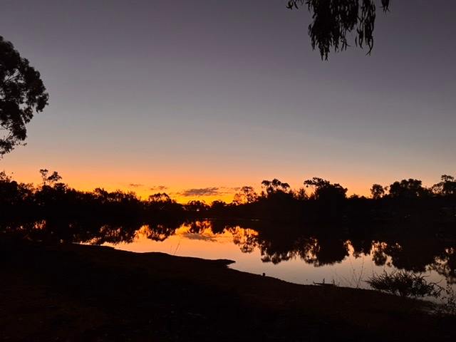 Sunset reflections on the dam. 