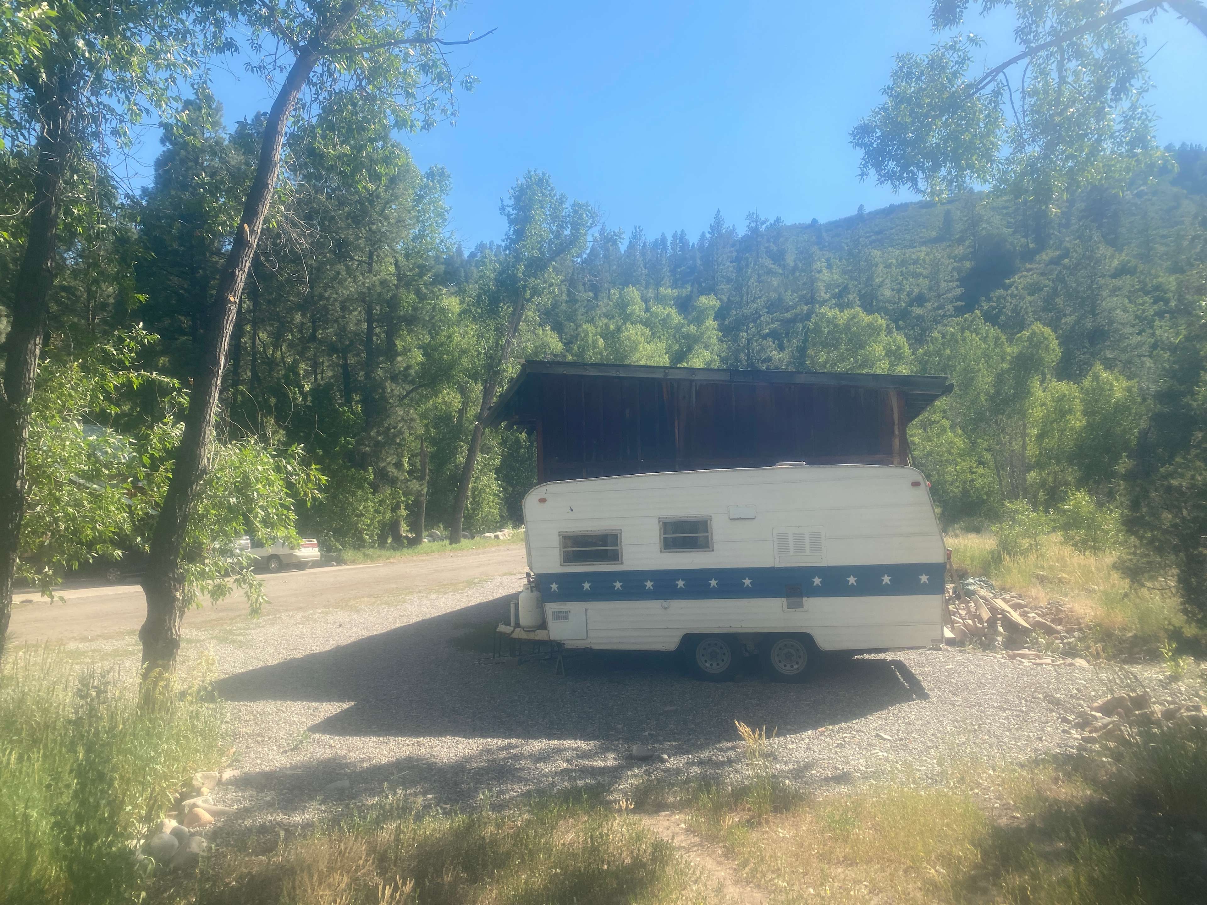 The spot is right where this camper is currently parked!  Afternoon shade!!