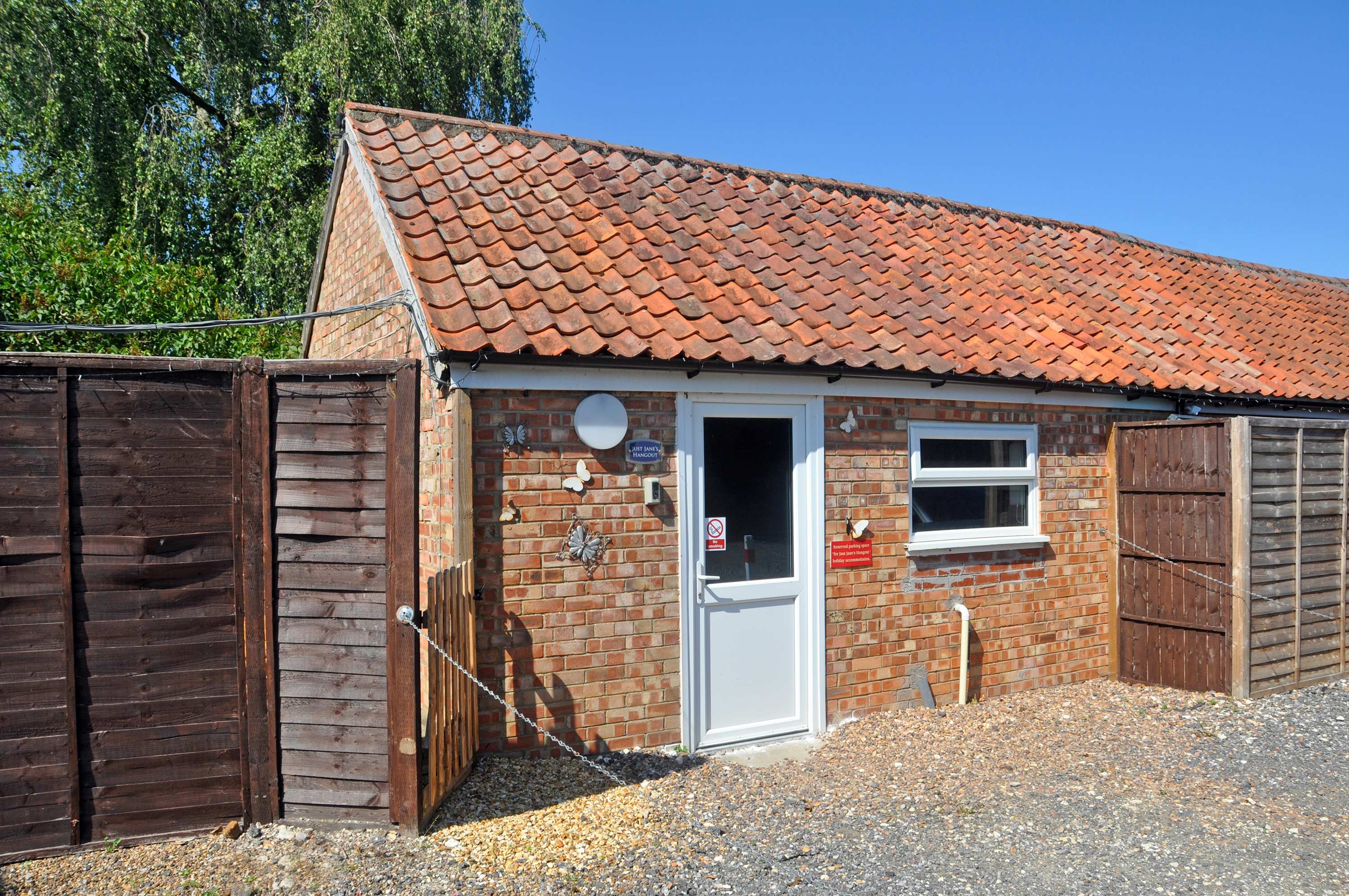Alternative accommodation owned by the site, set within the shared campsite/pub carpark.