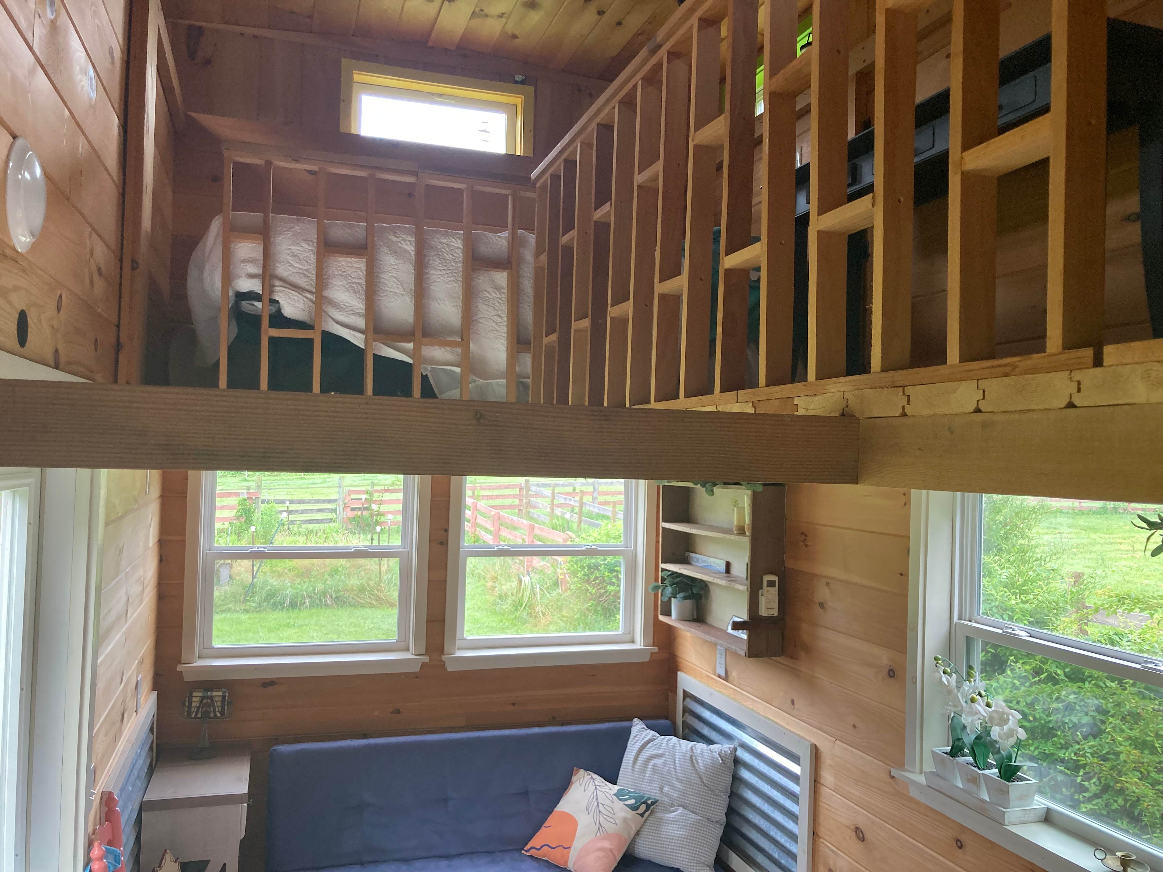 Comfortable lofted bed, below is sofa-bed