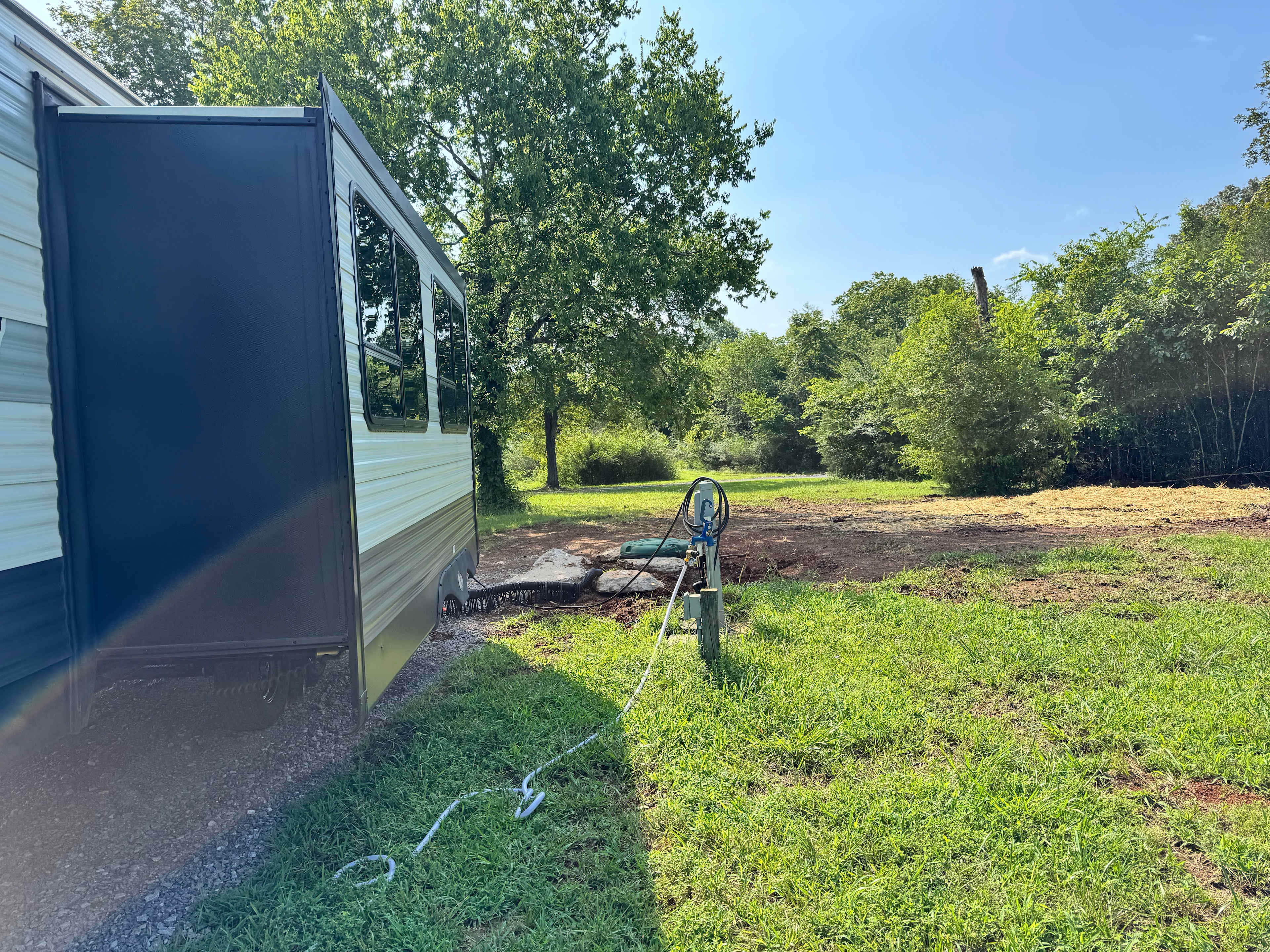Brand new sewer hookup. Landscaping after install still in progress. 