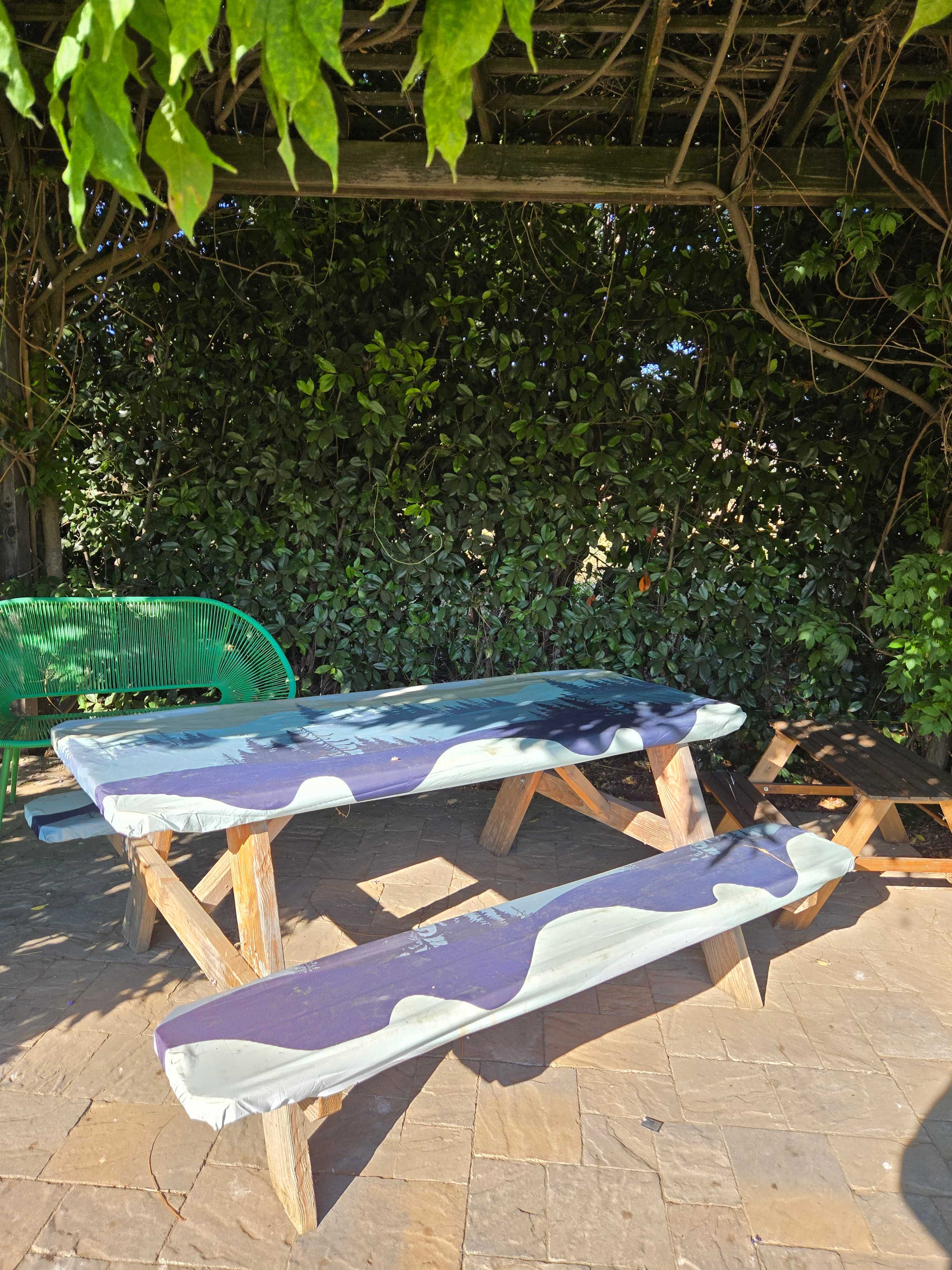 bench with shade under vines 