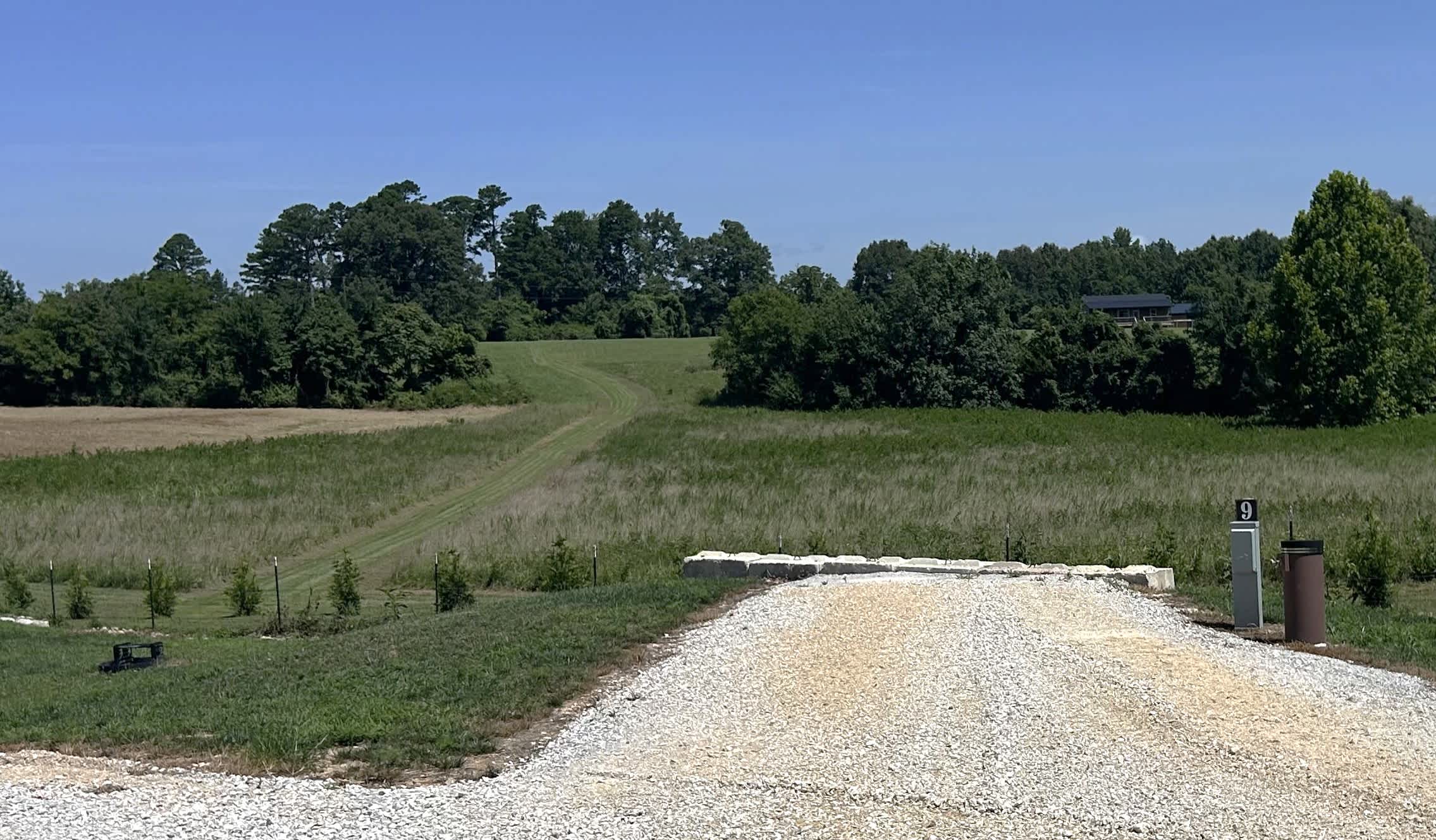 View of Site #9, which is a back-in site with electric/water only (we are the only campground in the area that offers potable water)!  50/30/20 amp service is available - take your pick. 