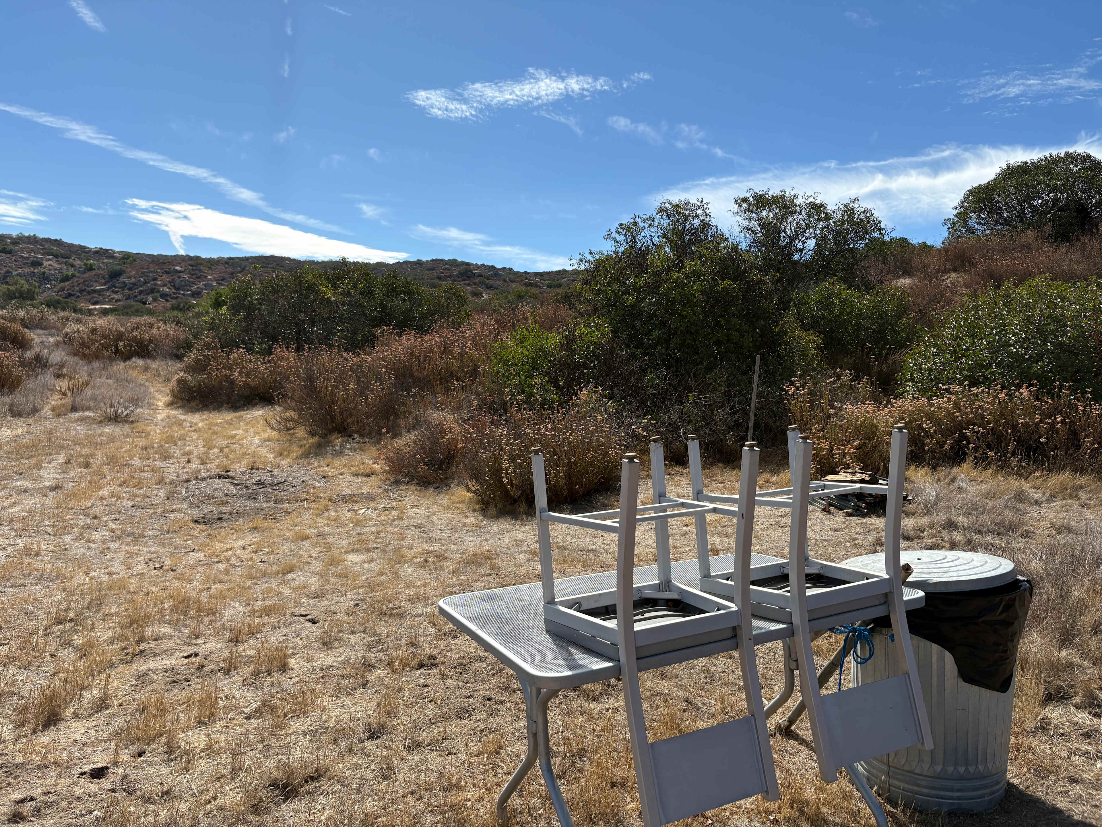 Table, Chairs, Trash Bin 